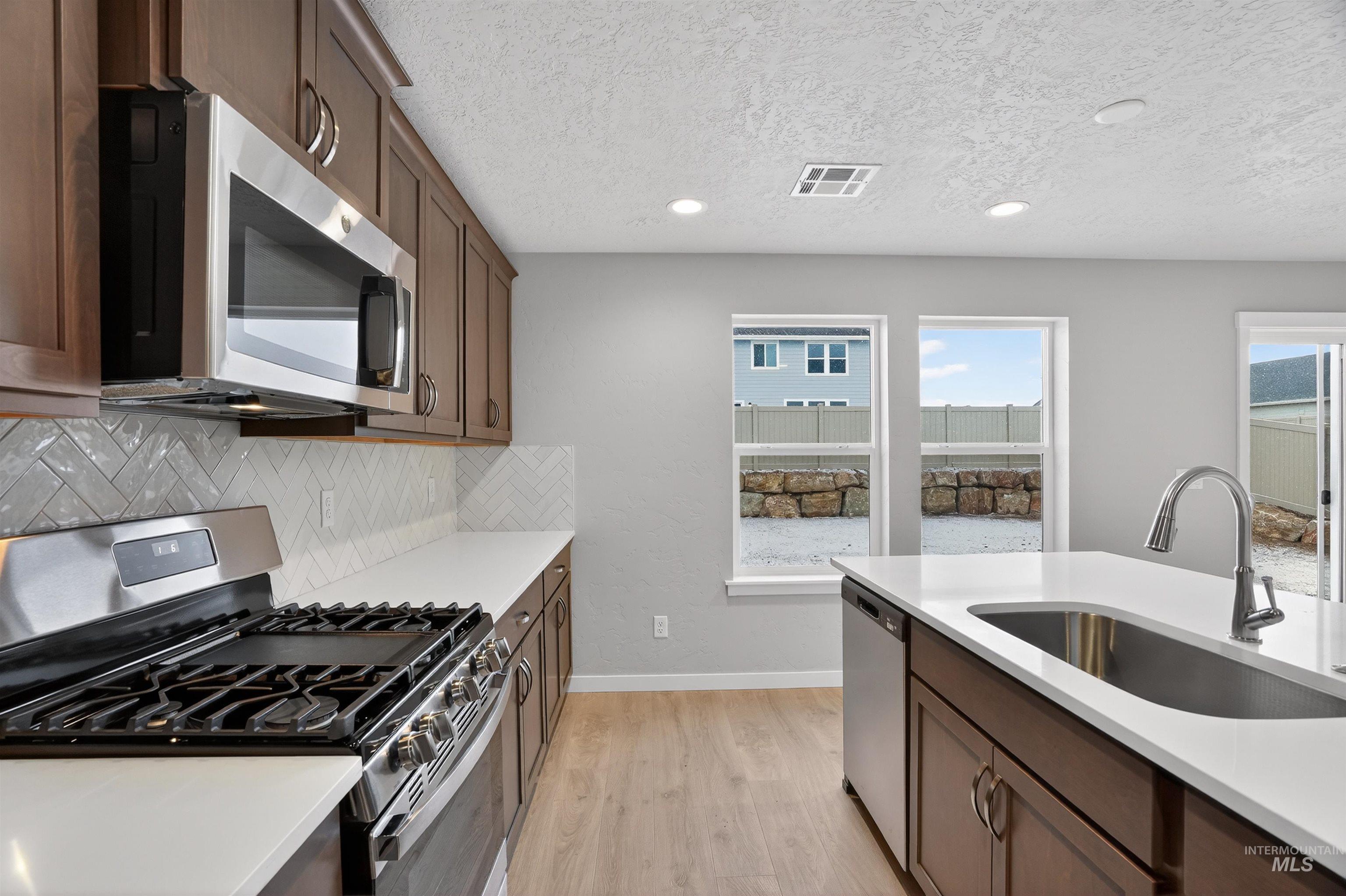 1585 SW Silverstone Ave, Mountain Home, Idaho 83647, 3 Bedrooms, 2.5 Bathrooms, Residential For Sale, Price $439,990,MLS 98955145