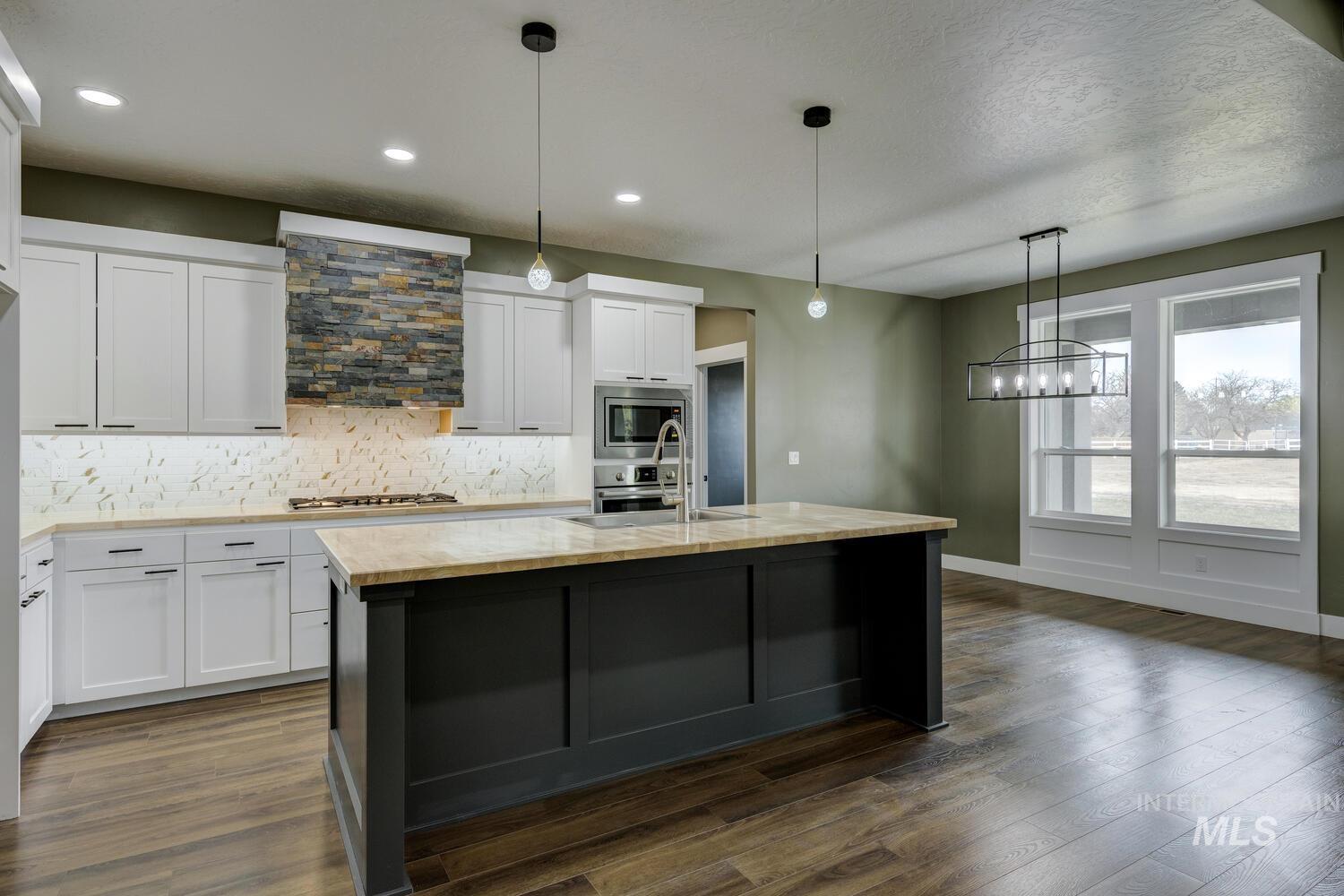 1107 W Blaine Ave, Nampa, Idaho 83651, 4 Bedrooms, 3 Bathrooms, Residential For Sale, Price $599,900, 98956866