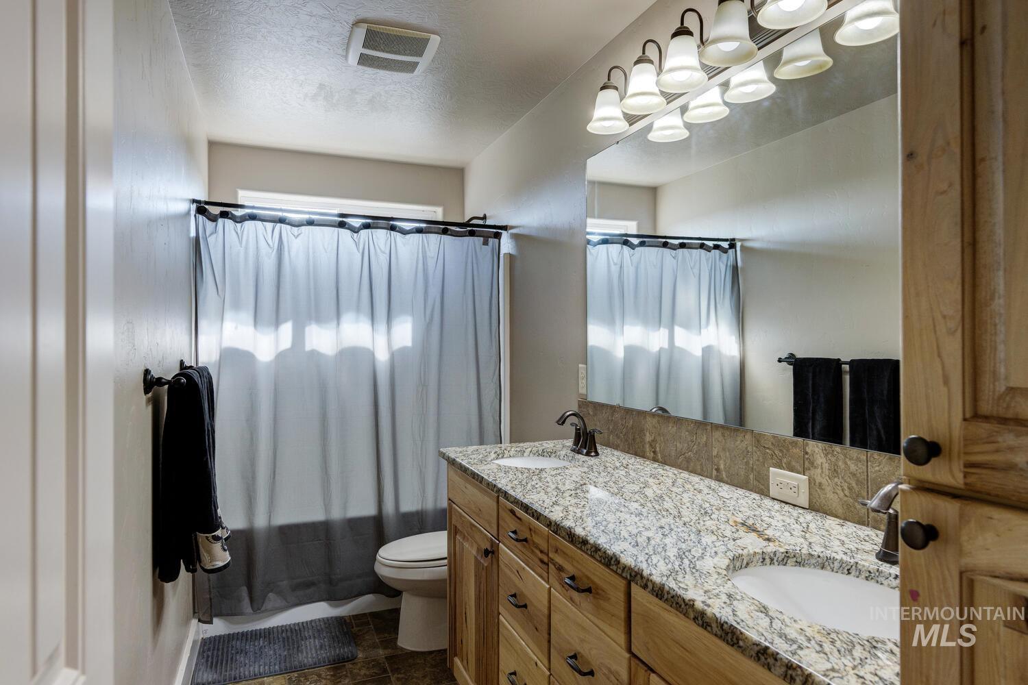 22757 Rosicky Way, Caldwell, Idaho 83607, 4 Bedrooms, 3.5 Bathrooms, Residential For Sale, Price $919,990,MLS 98958579