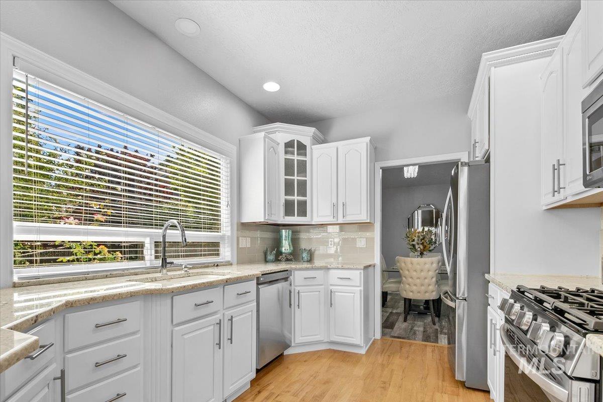 5674 N Heathrow Way, Boise, Idaho 83713, 3 Bedrooms, 2.5 Bathrooms, Residential For Sale, Price $587,900,MLS 98958732