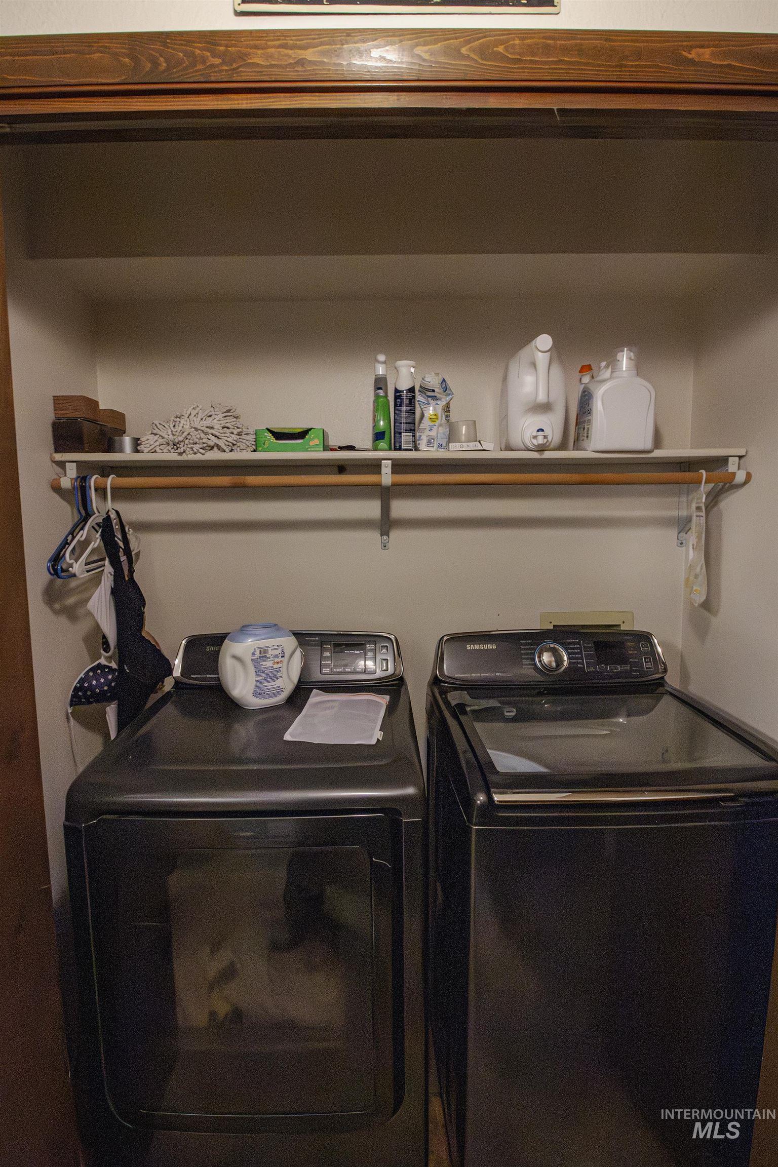 Laundry area featuring washer and clothes dryer