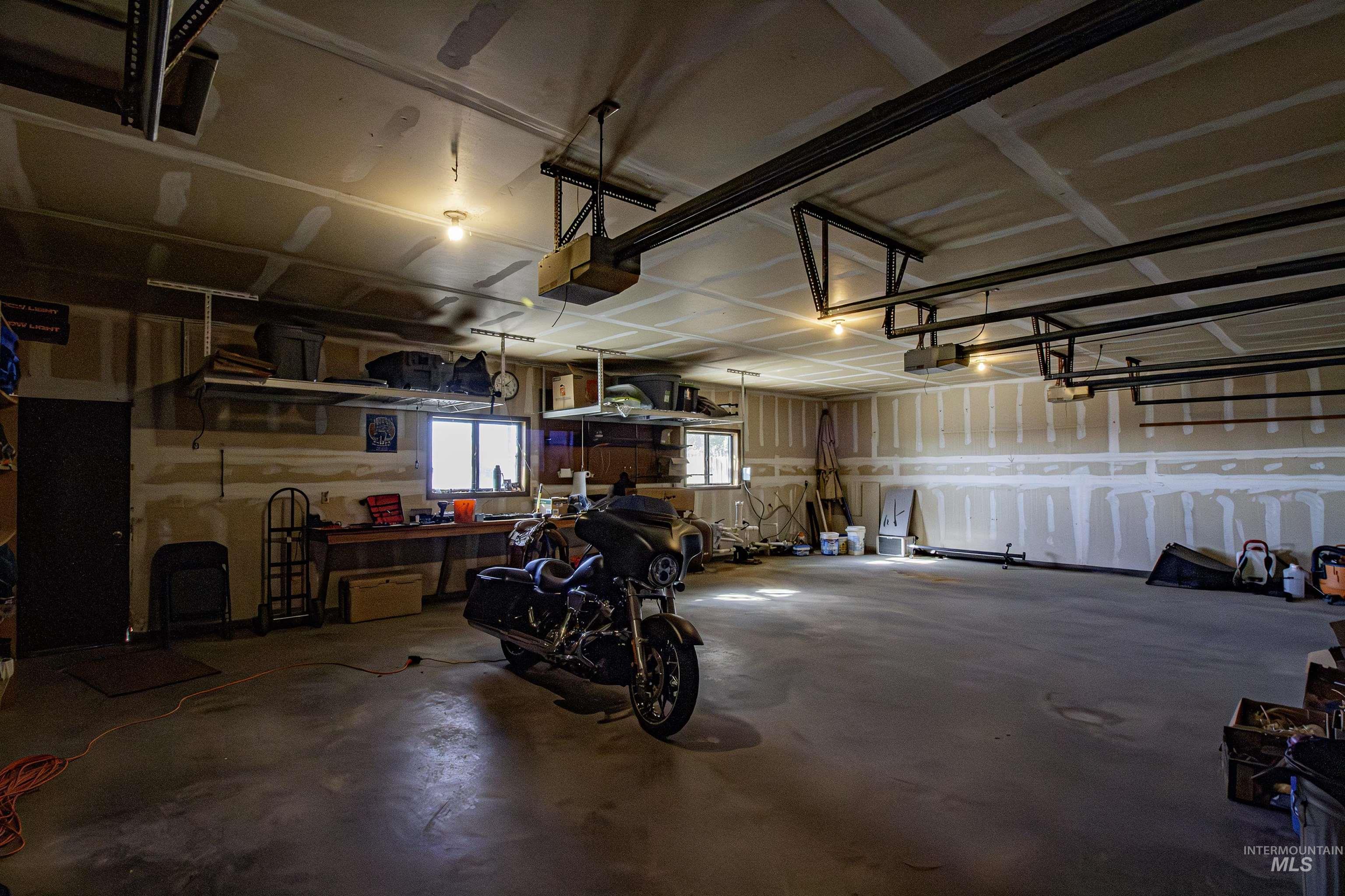 Garage featuring a garage door opener