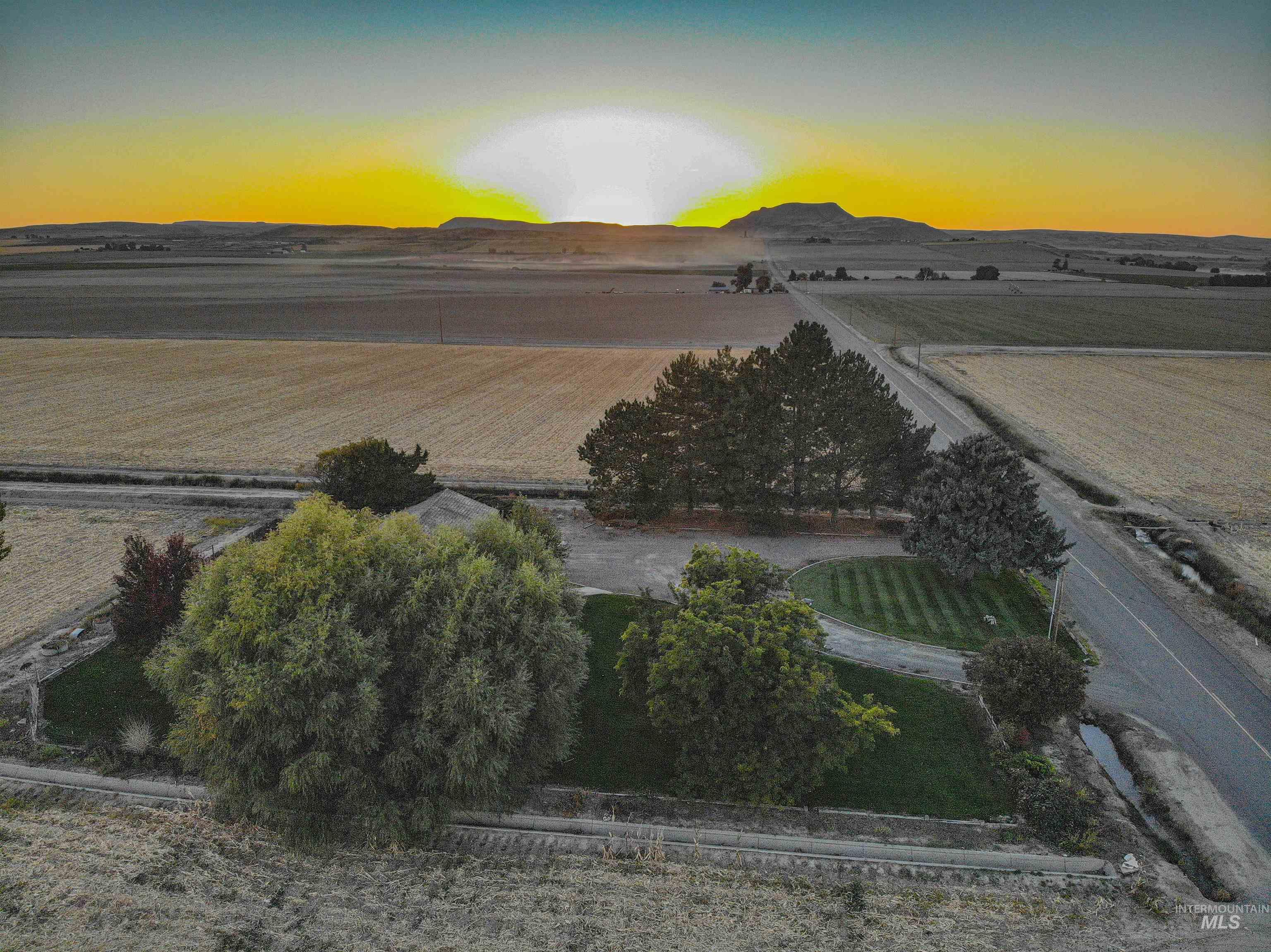 Aerial view at dusk of a view of rural / pastoral area and agricultural area