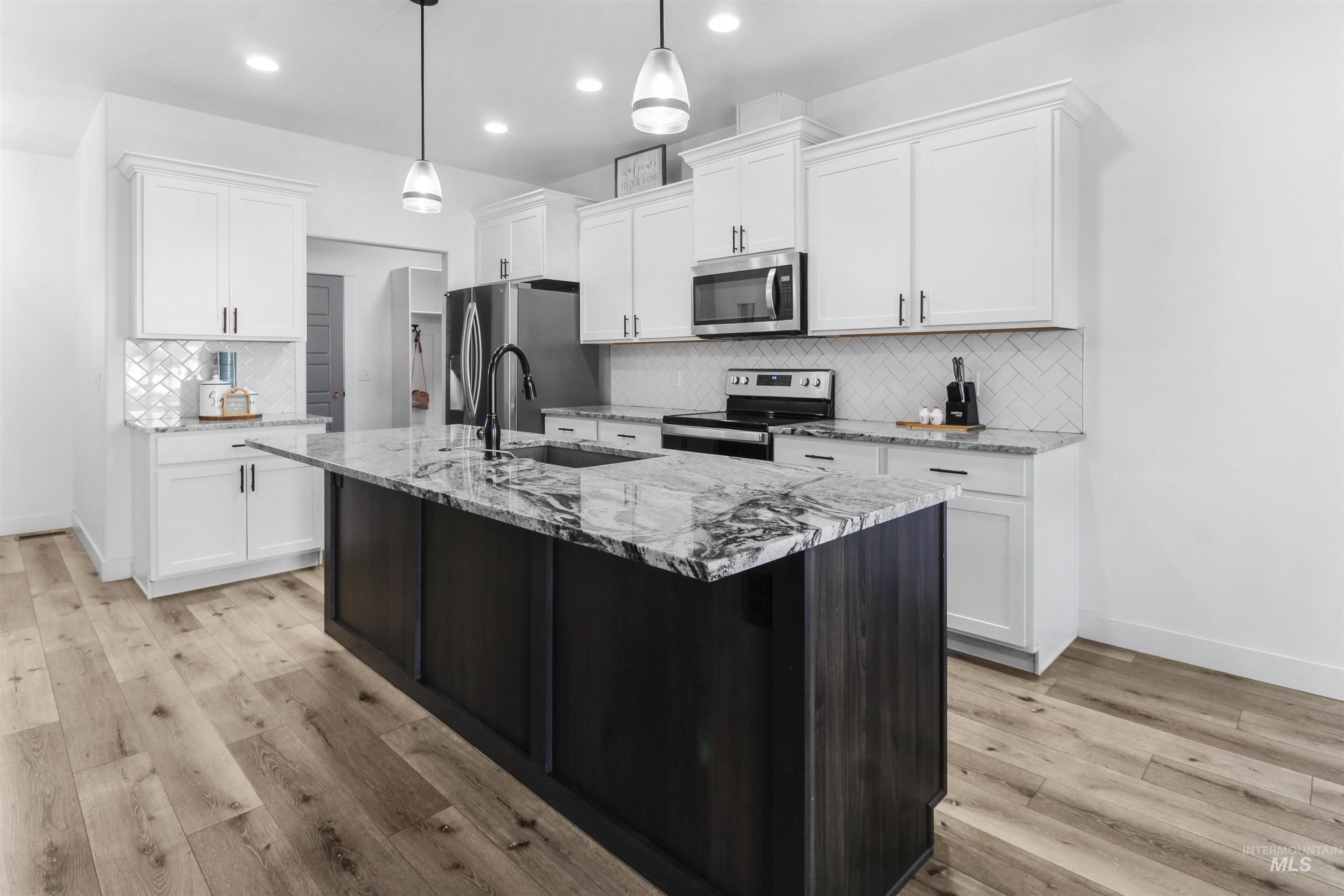 590 W 24th Street, Burley, Idaho 83318, 4 Bedrooms, 2 Bathrooms, Residential For Sale, Price $405,000,MLS 98964360