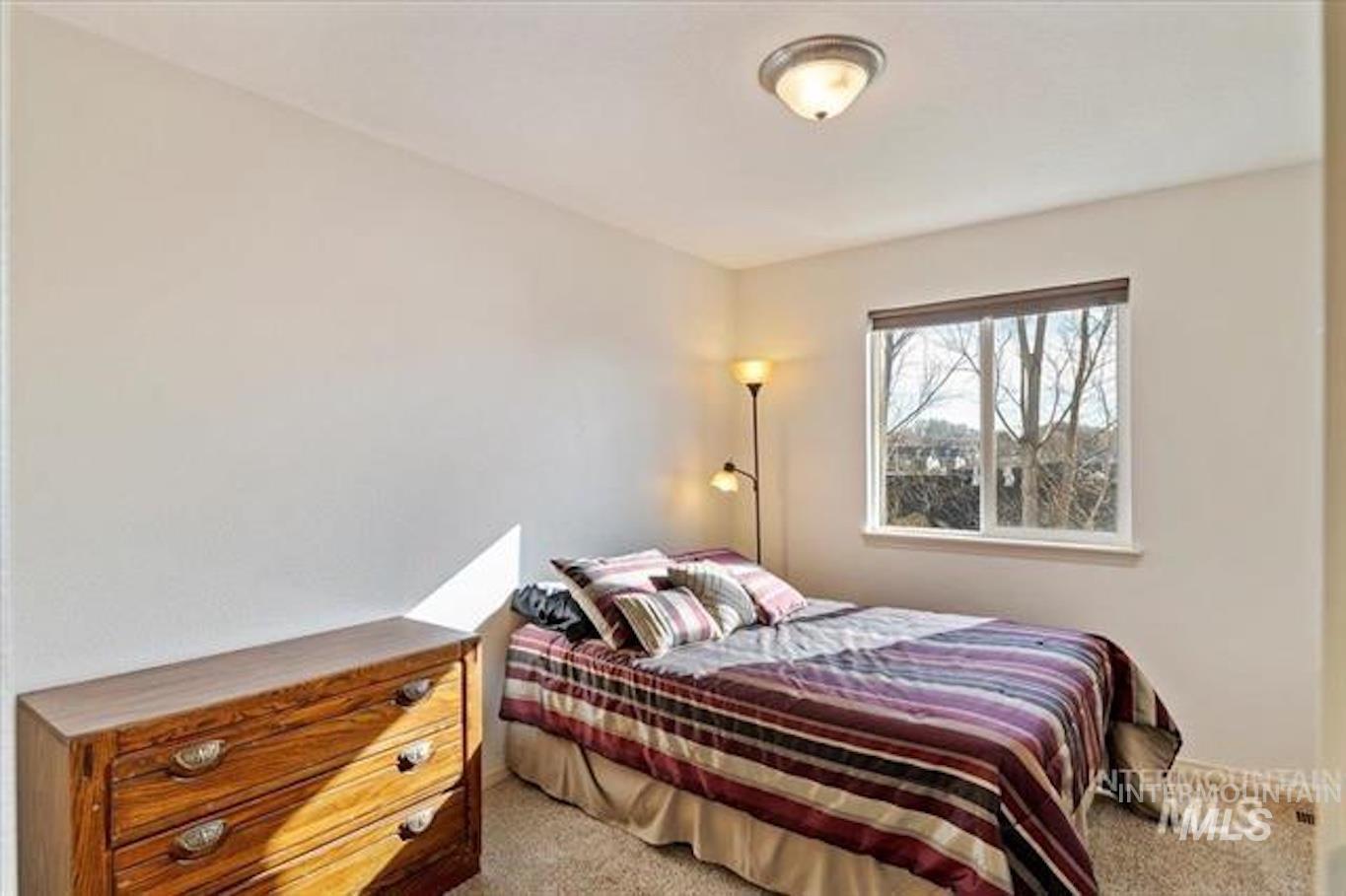 Bedroom featuring carpet floors