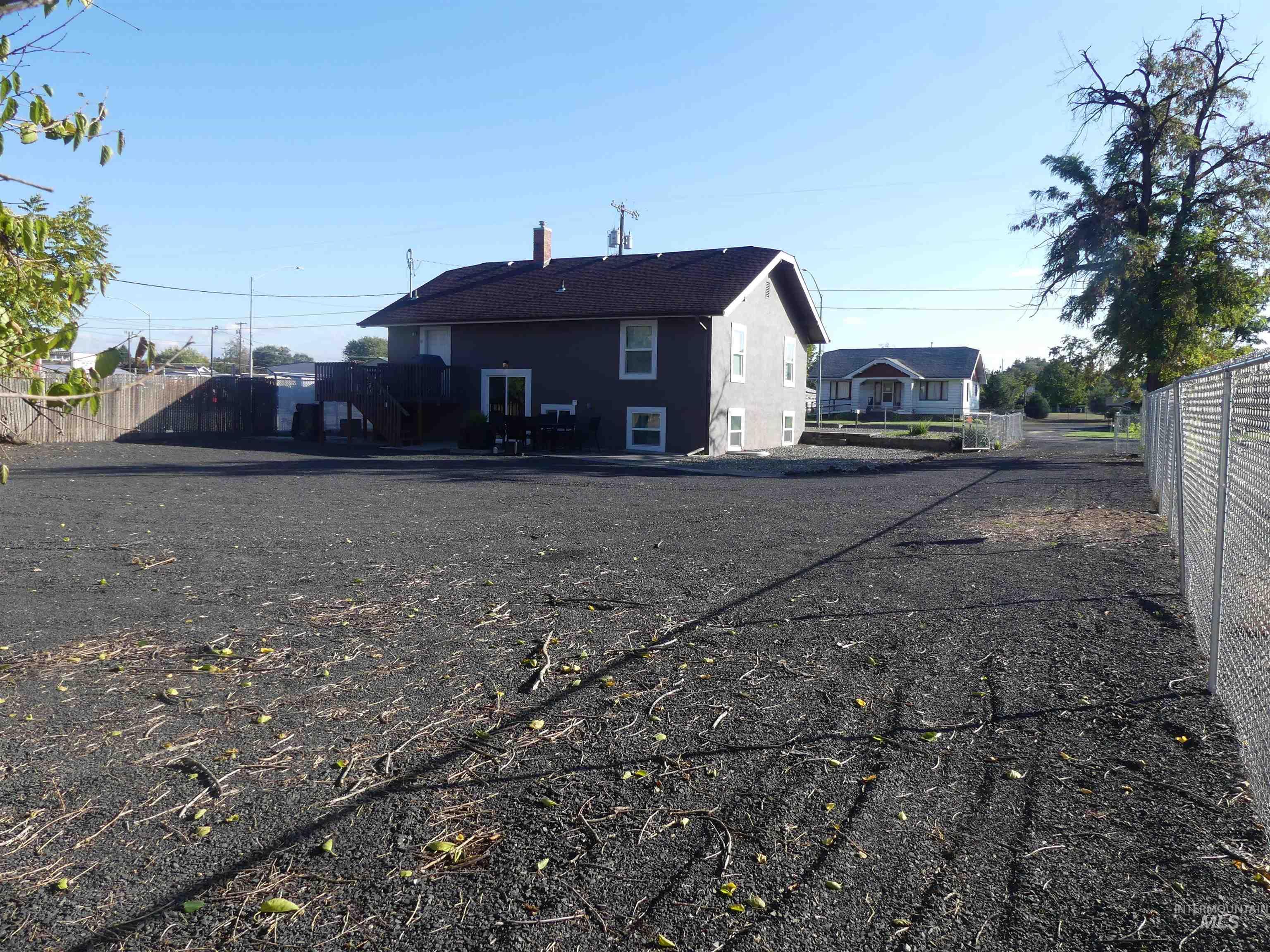 Rear view of property featuring a patio