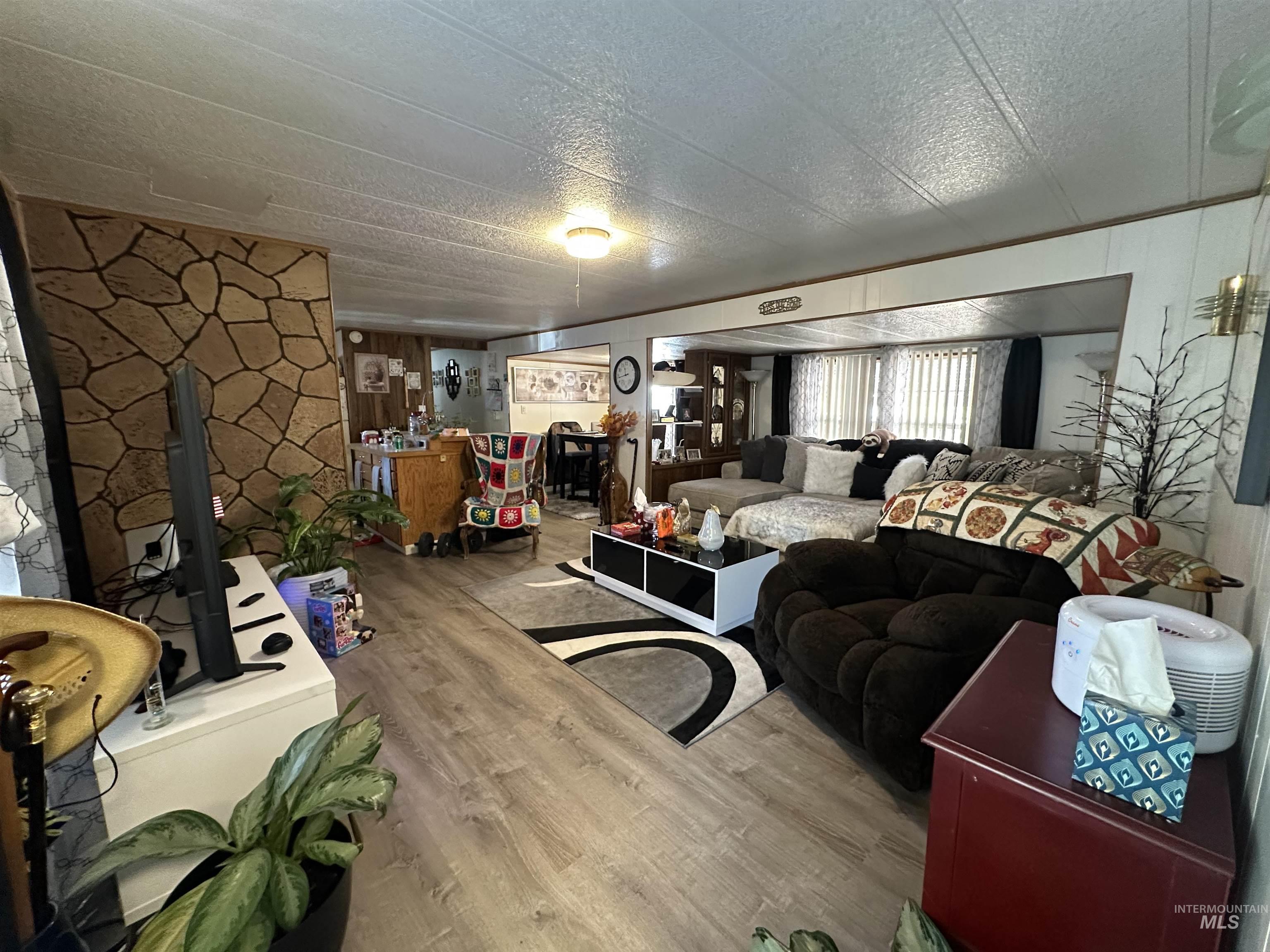 Living area featuring wood finished floors
