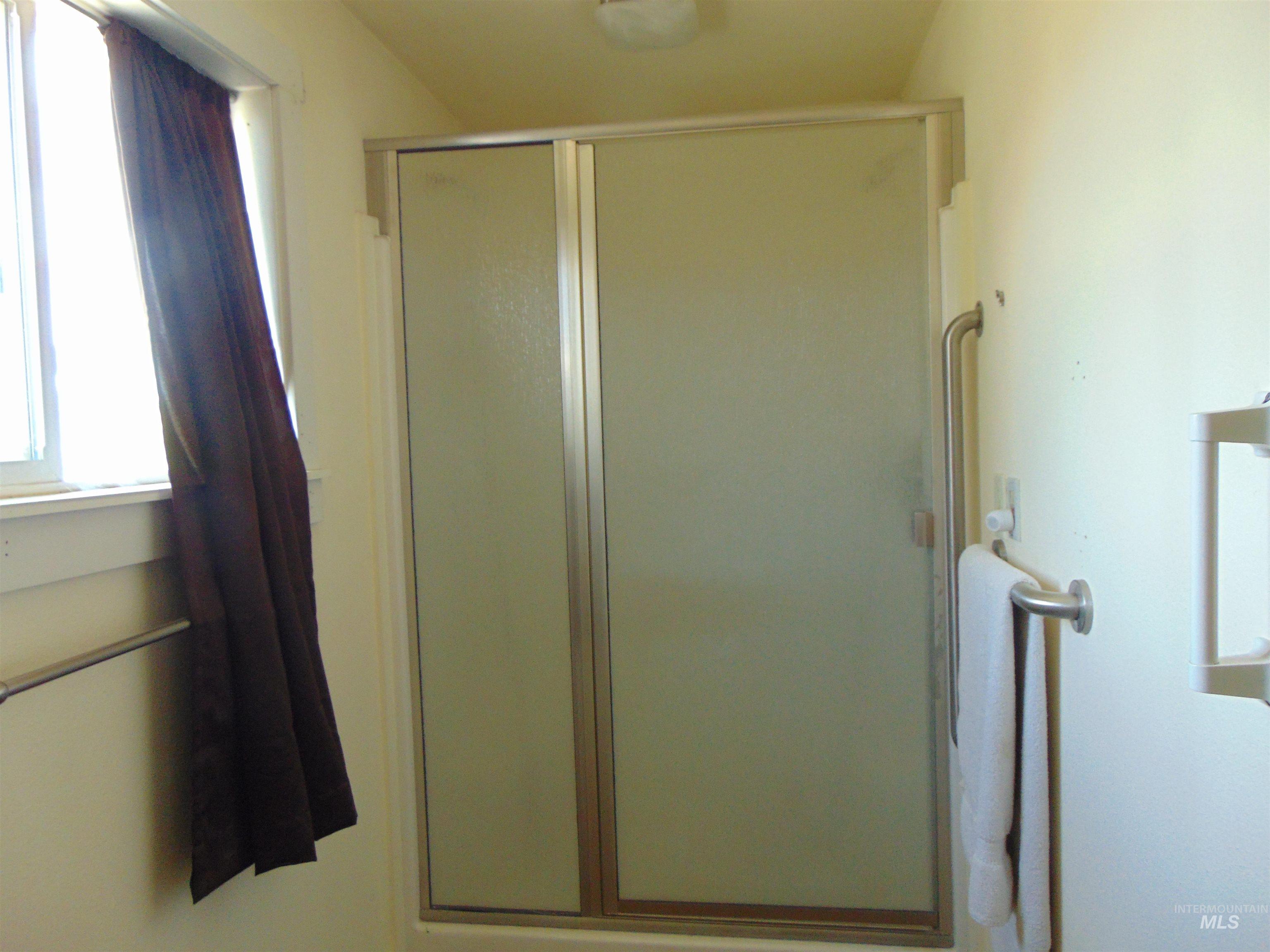 Bathroom featuring a stall shower