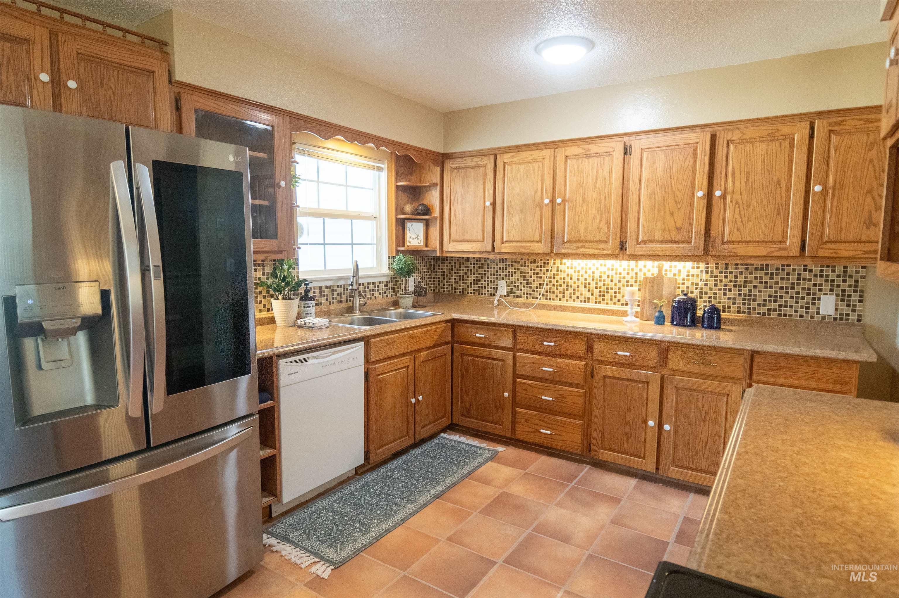 680 E 12th N, Mountain Home, Idaho 83647-6368, 3 Bedrooms, 2 Bathrooms, Residential For Sale, Price $315,000,MLS 98966312