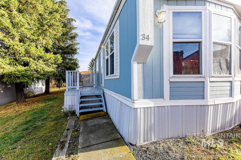 View of home's exterior featuring a yard