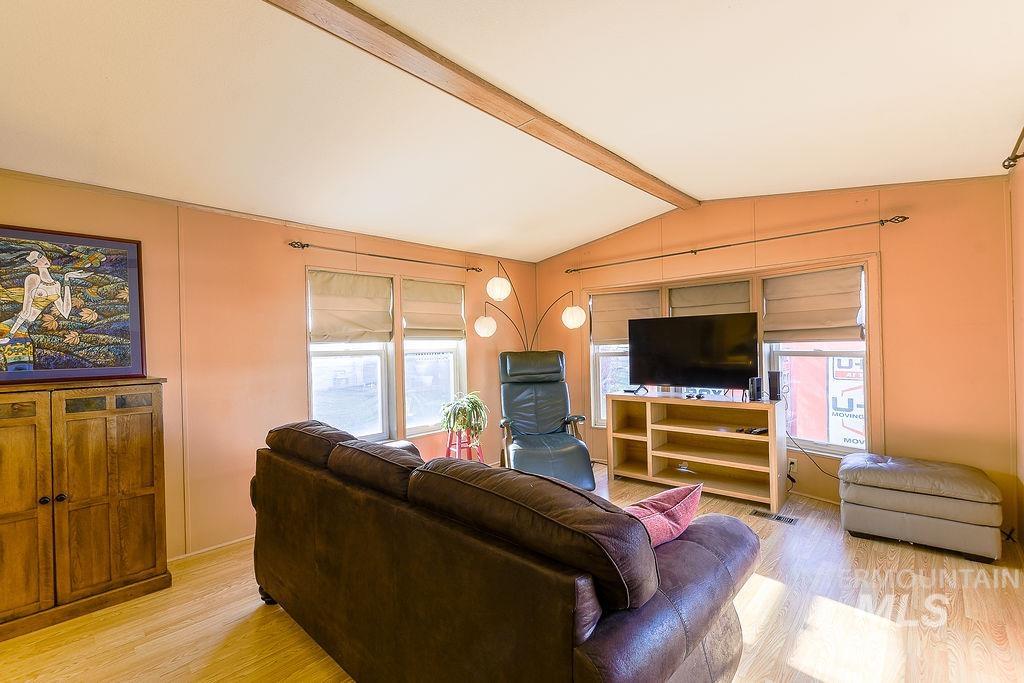 Living area with light wood-style floors