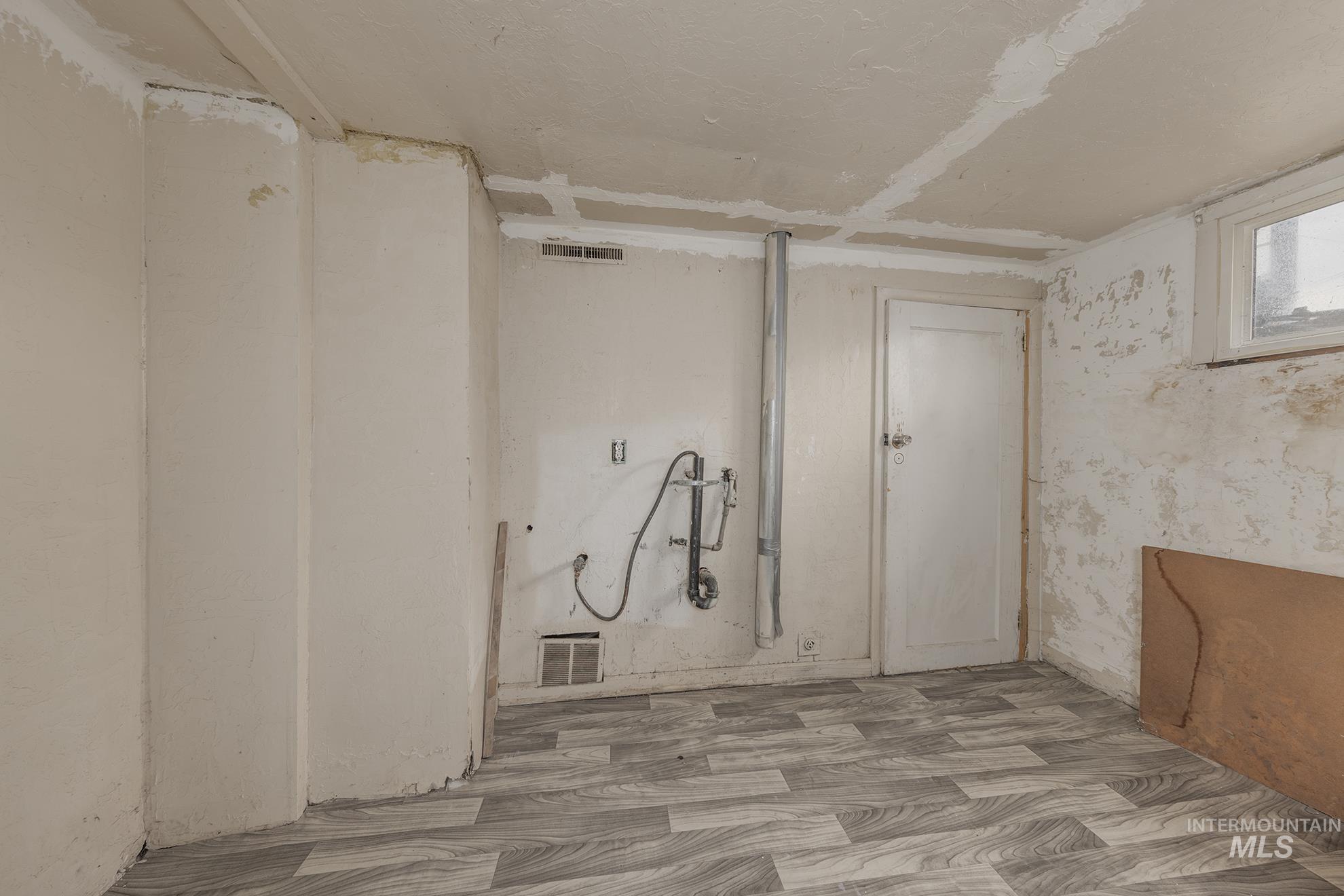 Below grade area featuring wood finished floors