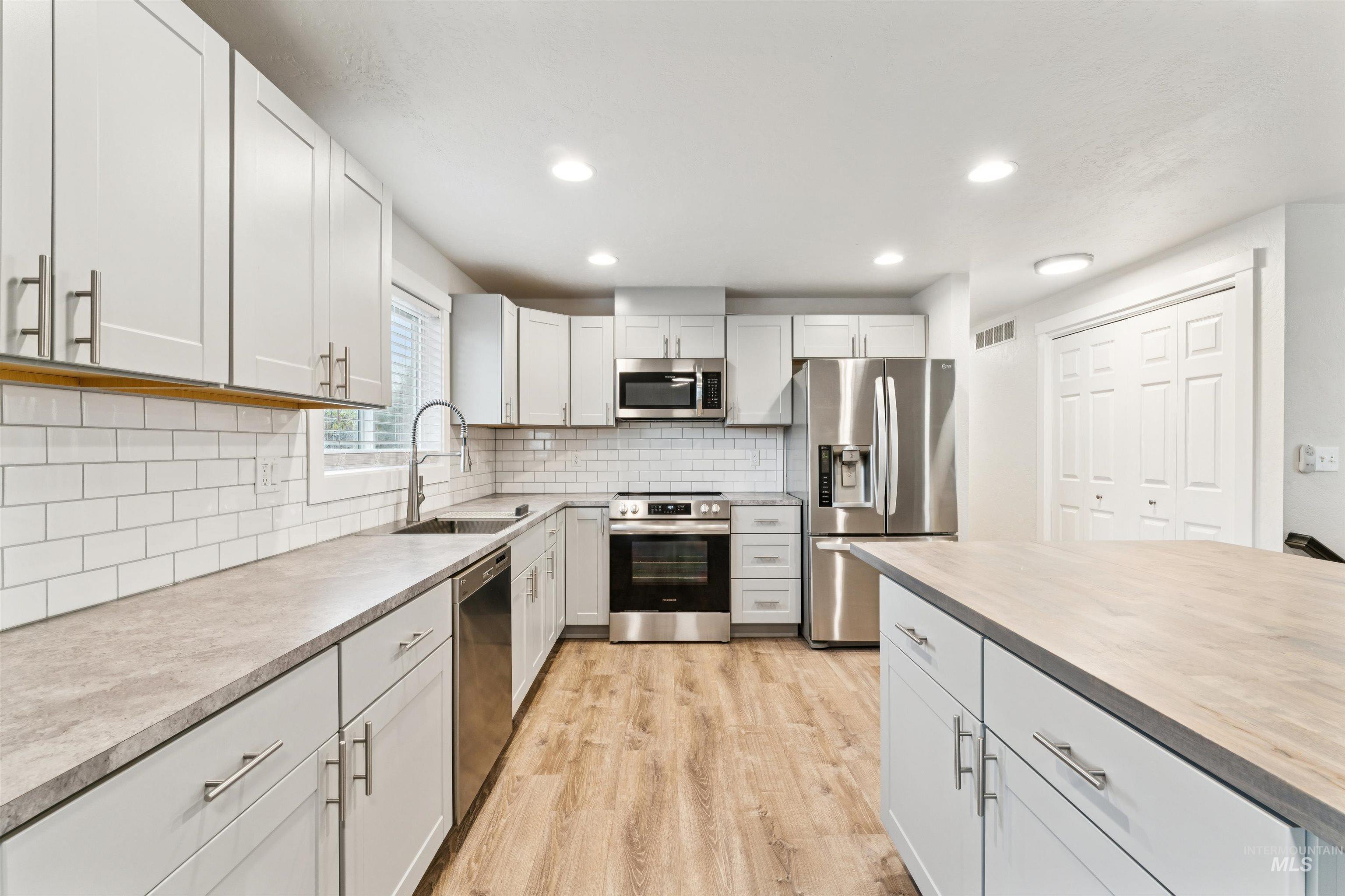 4811 N Leather Way, Boise, Idaho 83713-1847, 4 Bedrooms, 3 Bathrooms, Residential For Sale, Price $545,000,MLS 98967670