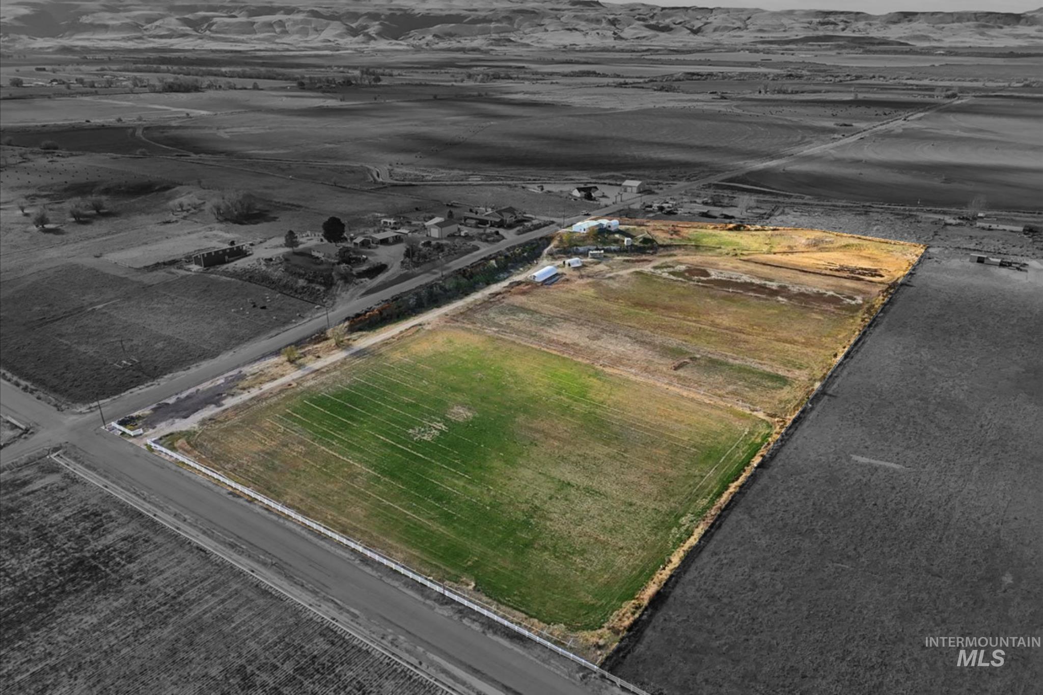 View of property location with rural landscape and farmland