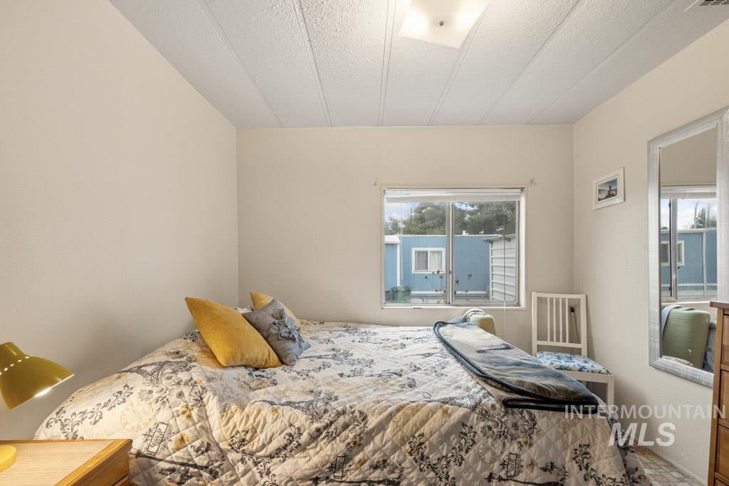 Bedroom featuring a textured ceiling