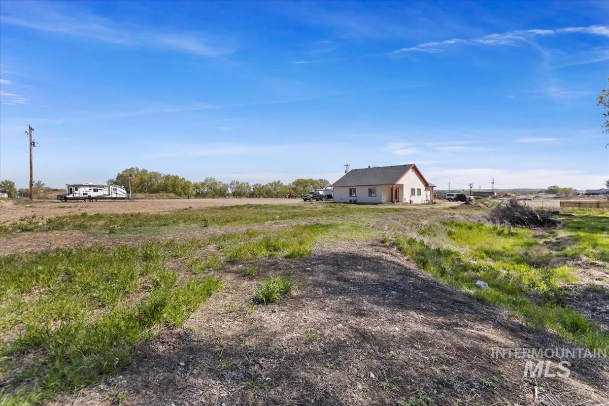View of yard with a view of rural / pastoral area
