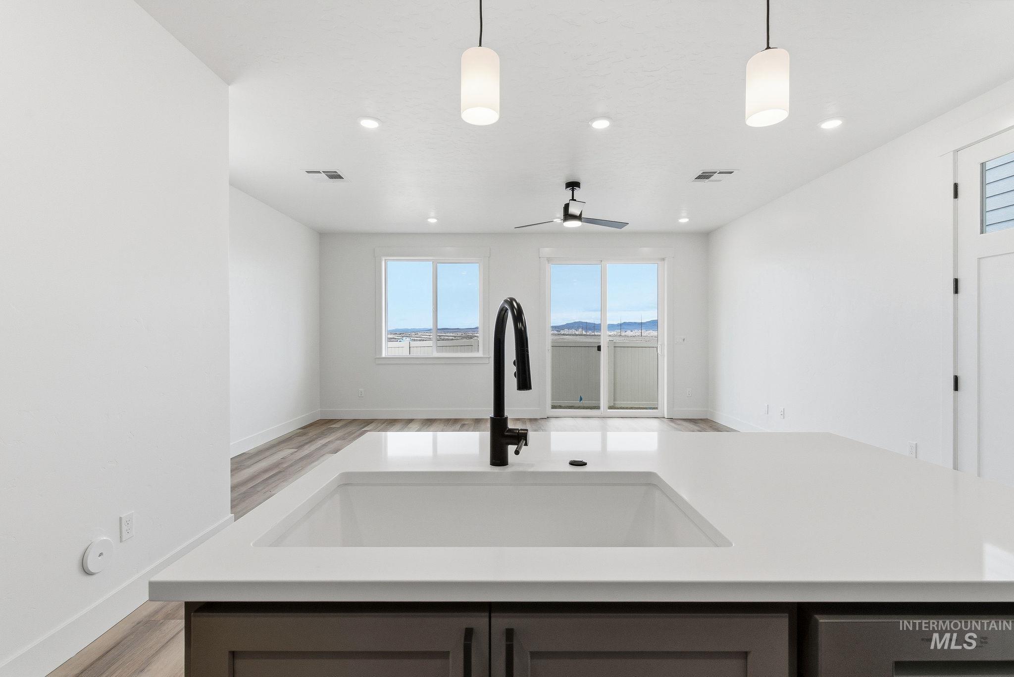 1970 NW Strahorn Dr., Mountain Home, Idaho 83647, 3 Bedrooms, 2.5 Bathrooms, Residential For Sale, Price $349,900,MLS 98968896