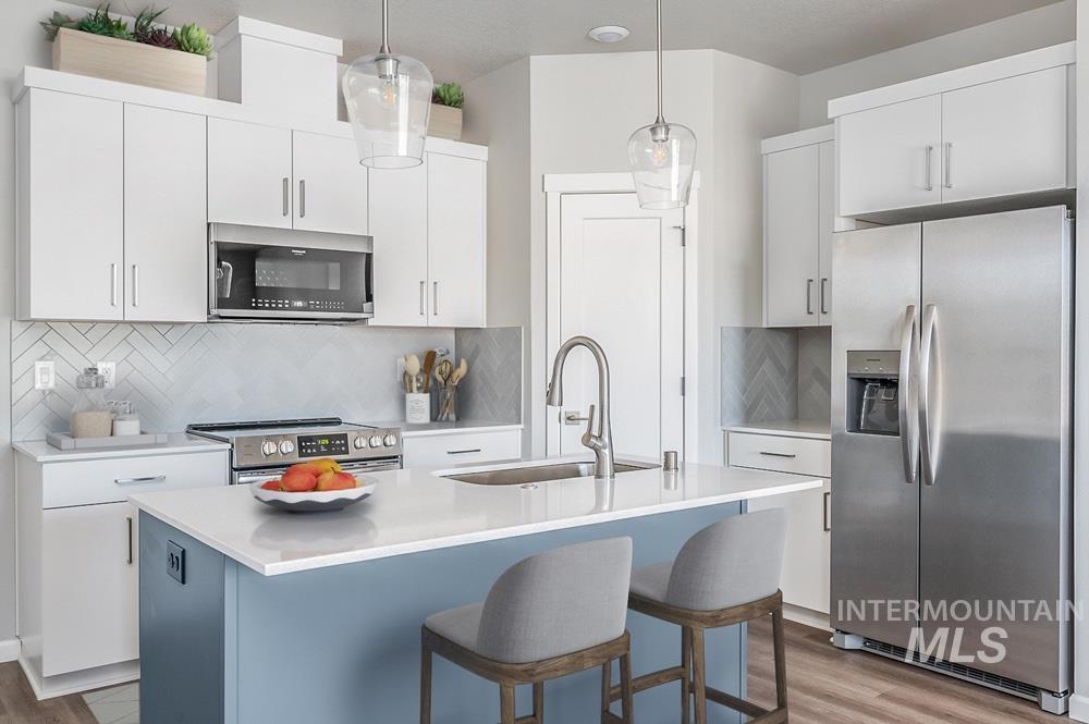 1970 NW Strahorn Dr., Mountain Home, Idaho 83647, 3 Bedrooms, 2.5 Bathrooms, Residential For Sale, Price $359,900,MLS 98968896