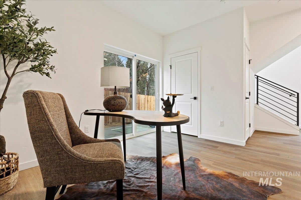 Office featuring light wood-style floors and baseboards