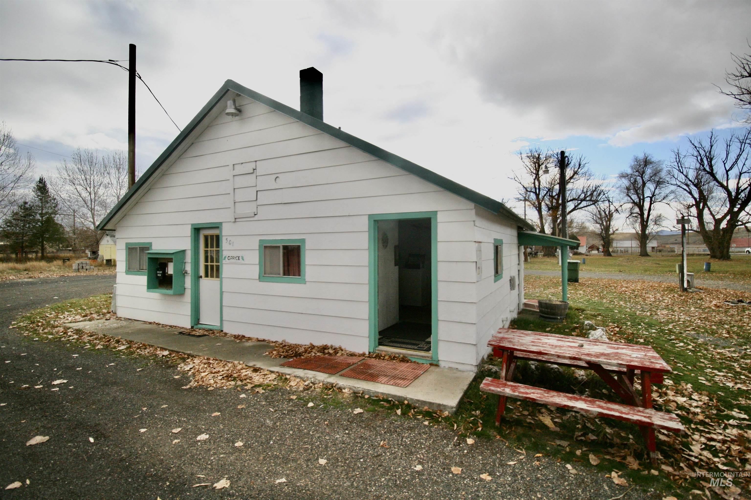 Rear view of house with a chimney