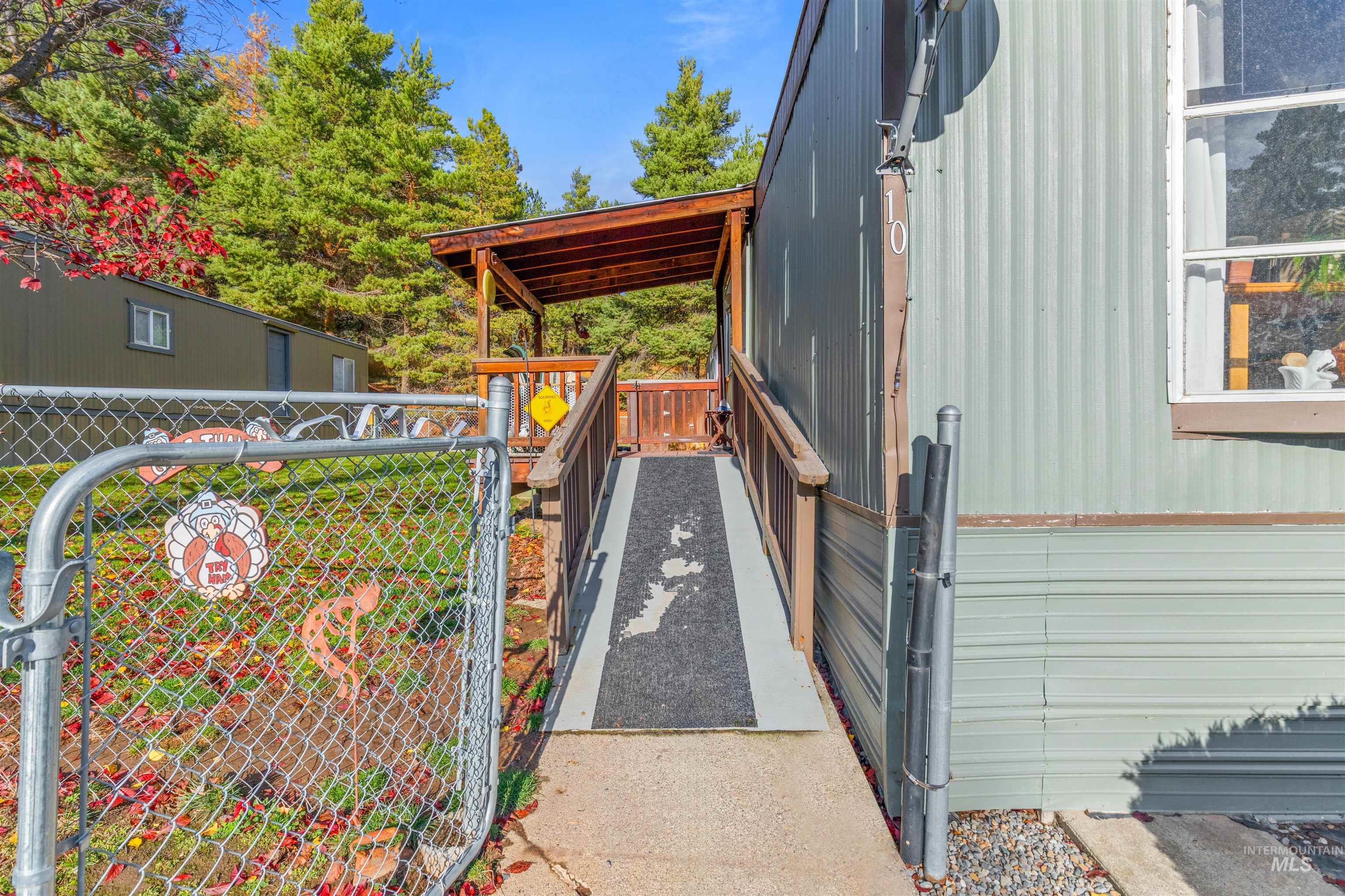 View of property exterior with a deck