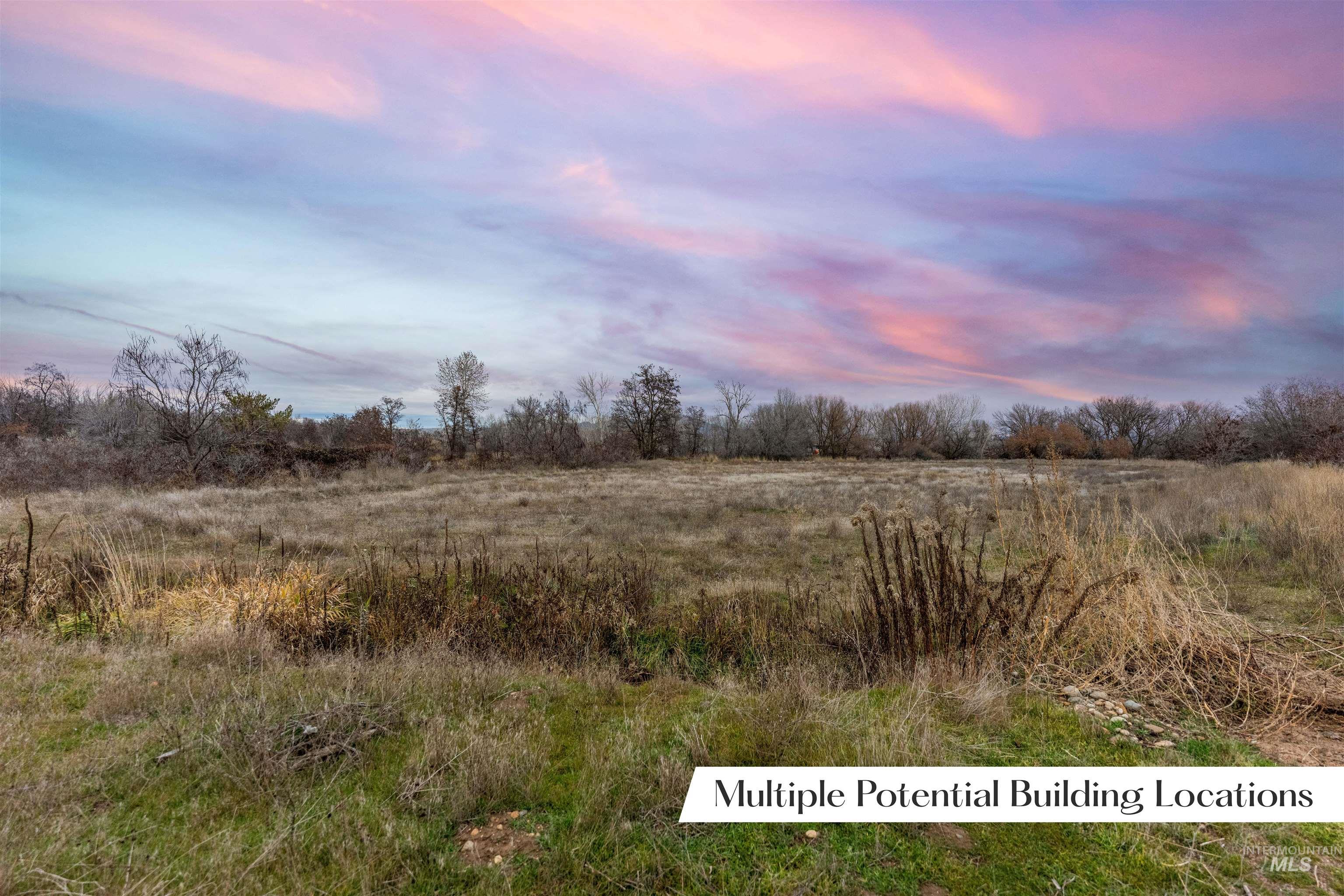 Nature at dusk with a view of rural / pastoral area