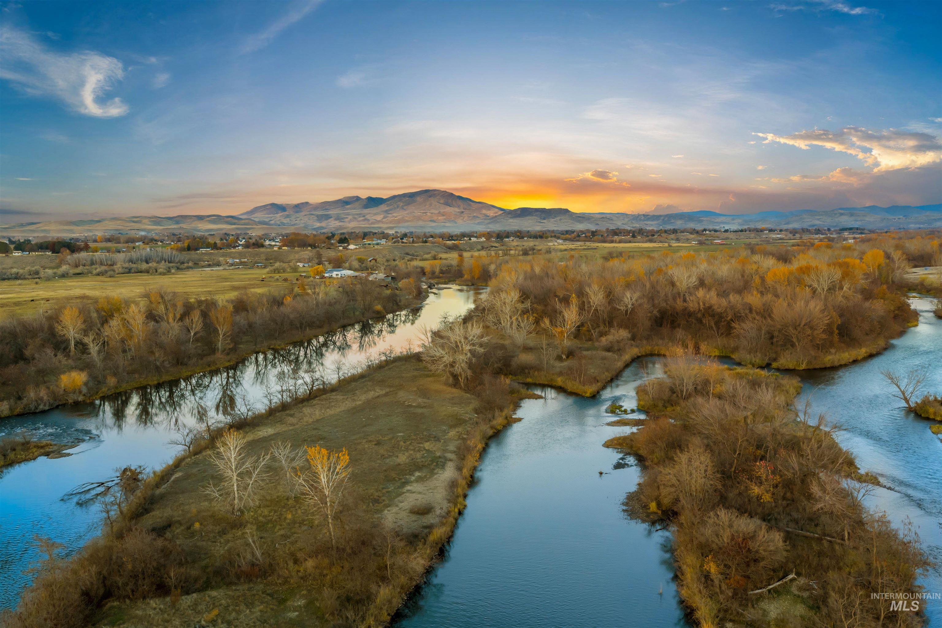 Aerial view at dusk of a water and mountain view