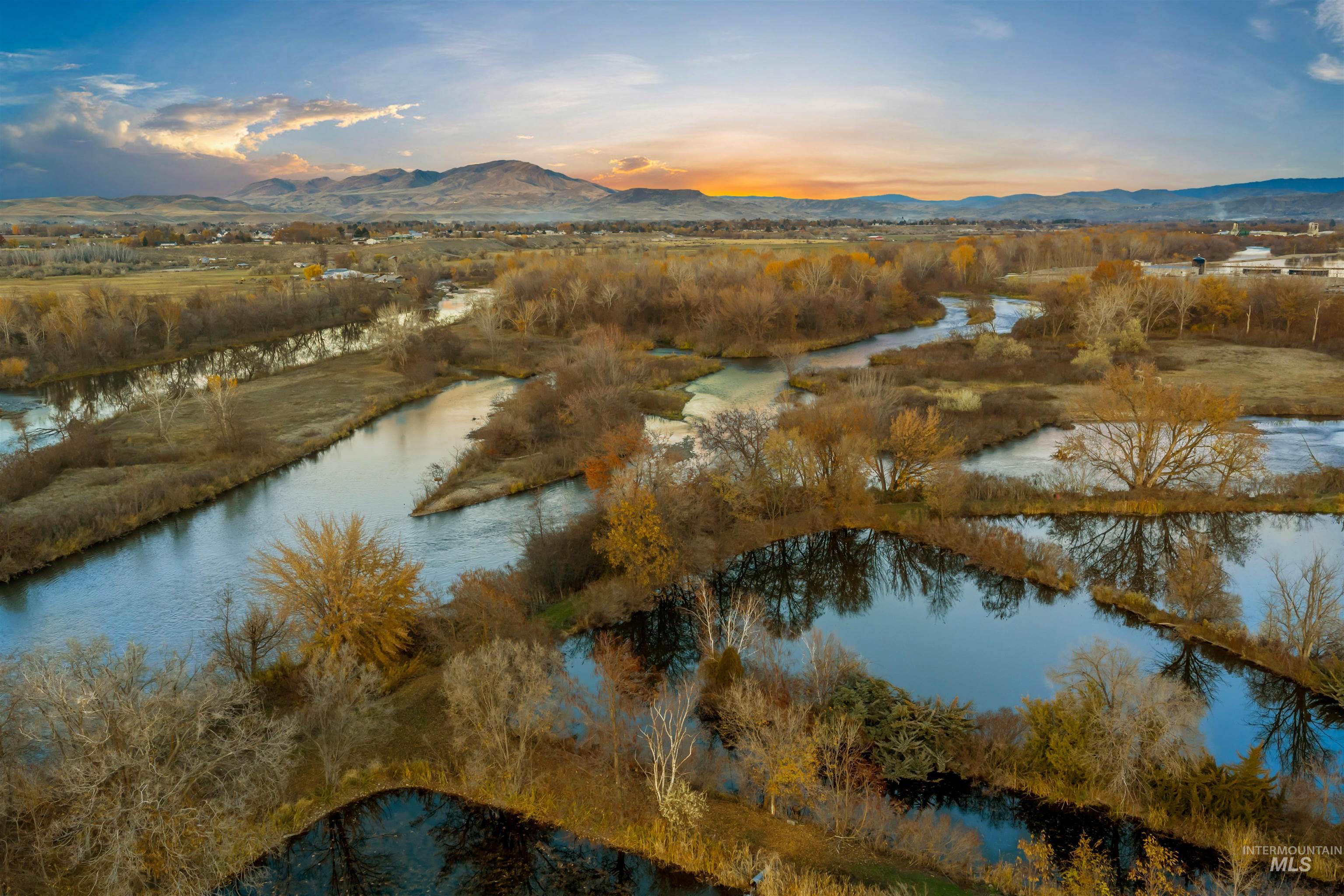 Aerial view at dusk of a water and mountain view