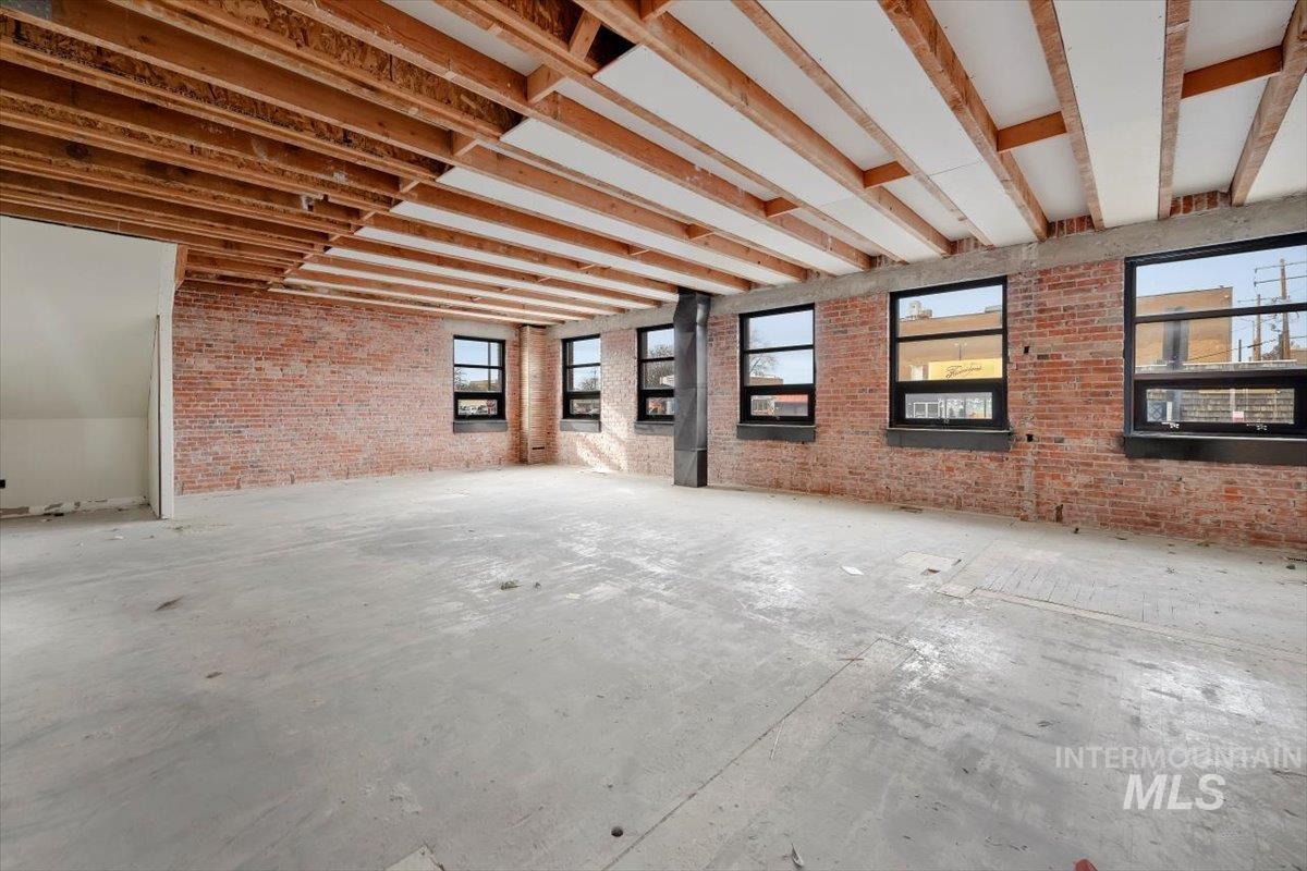 Misc room with brick wall