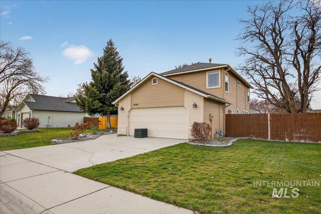 View of front of house featuring driveway