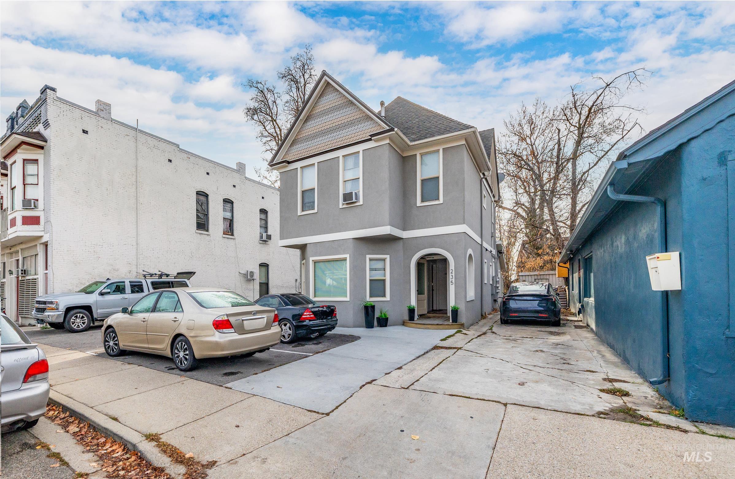 View of front of property featuring stucco siding