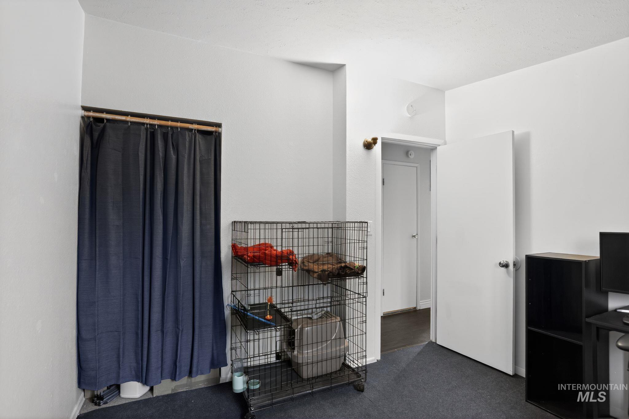 Office space with dark colored carpet