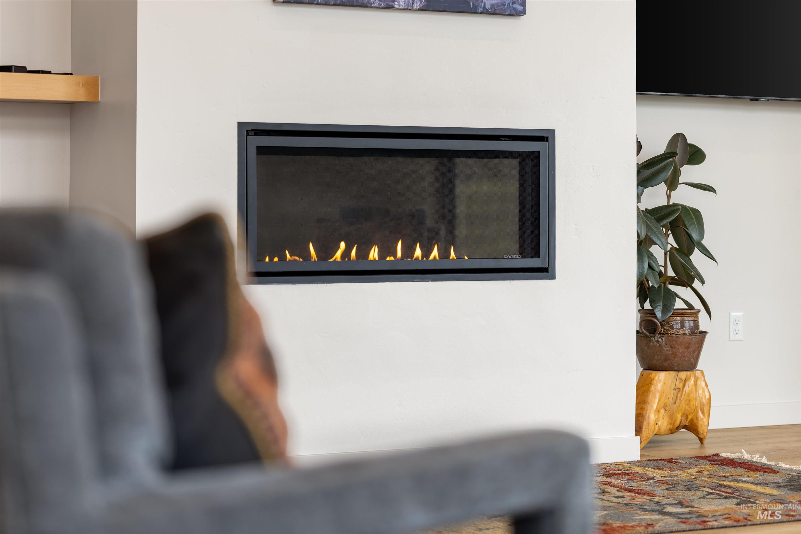 Detailed view of wood finished floors and baseboards