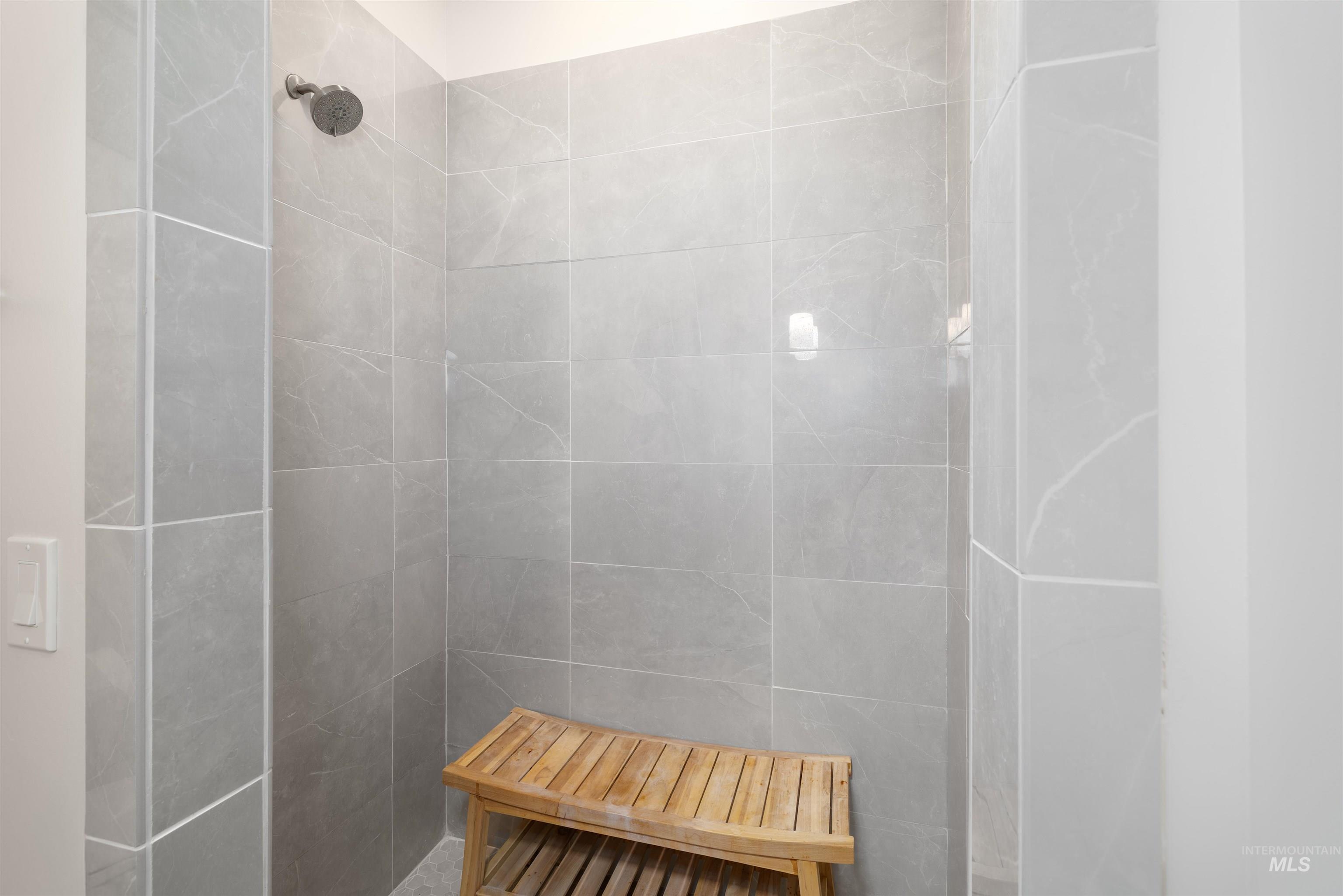 Full bath with tiled shower