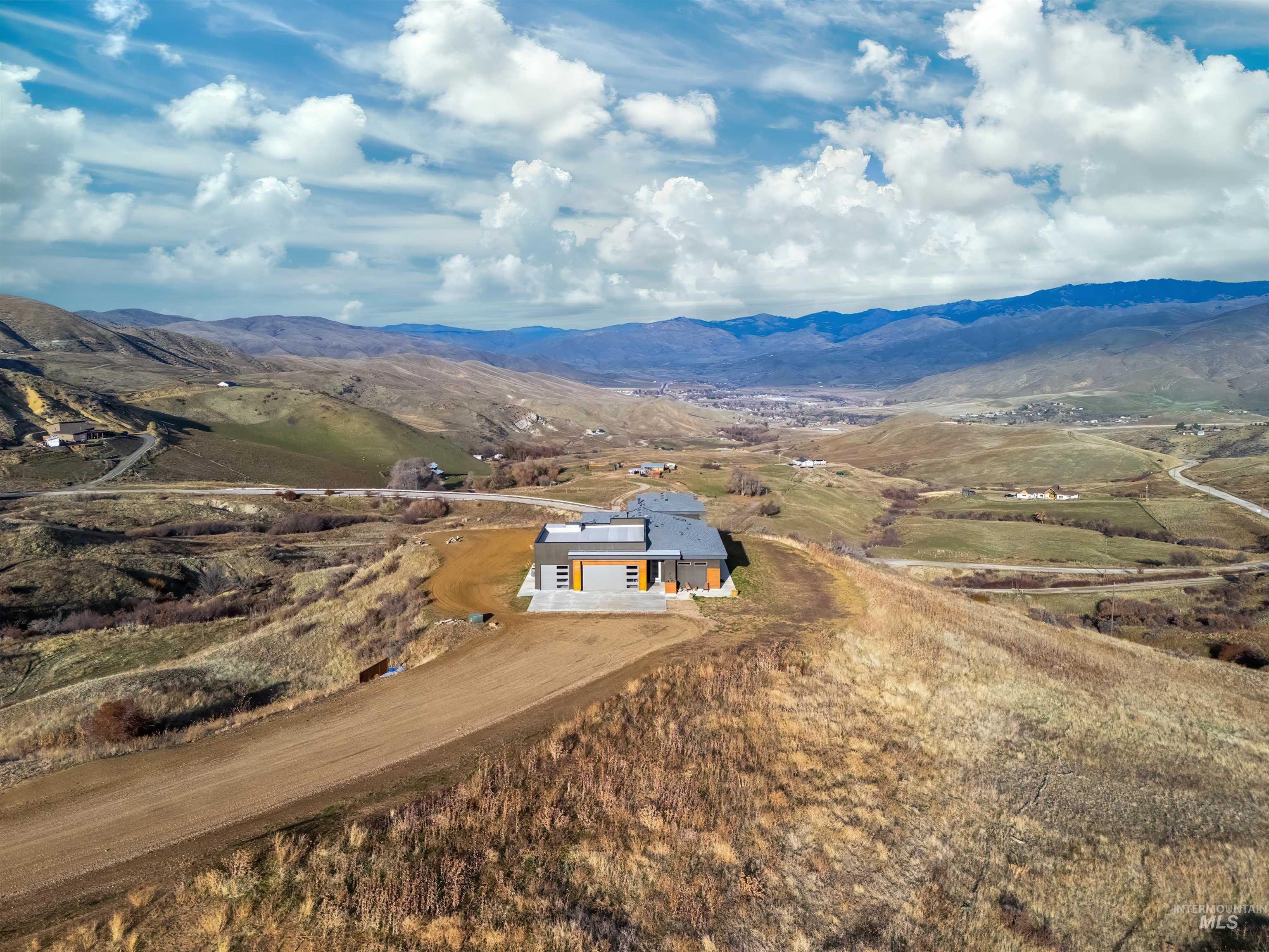 View from above of property featuring mountains