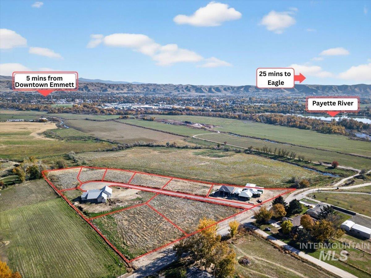 Aerial view of sparsely populated area with property boundaries highlighted