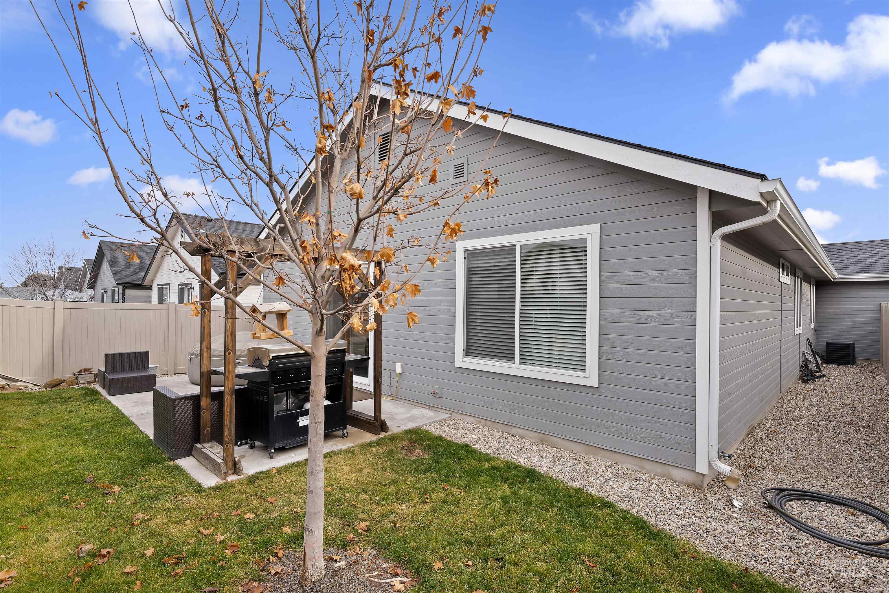 Back of property with a patio area