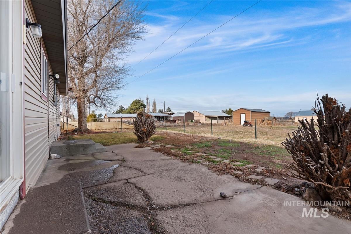 View of yard with a patio area