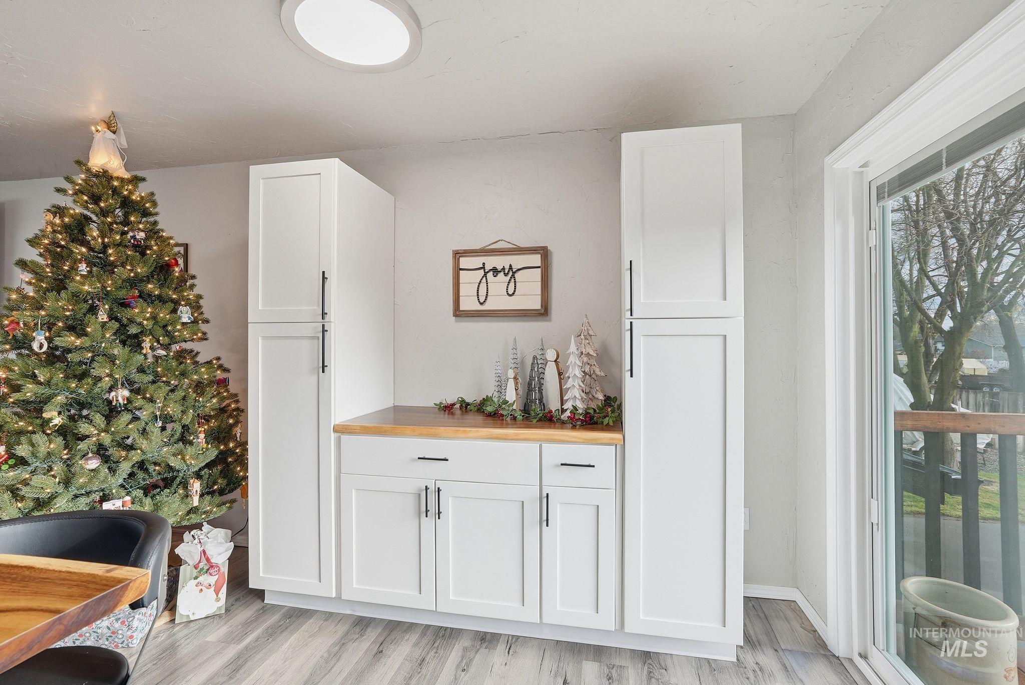 Sitting room featuring light wood-style flooring