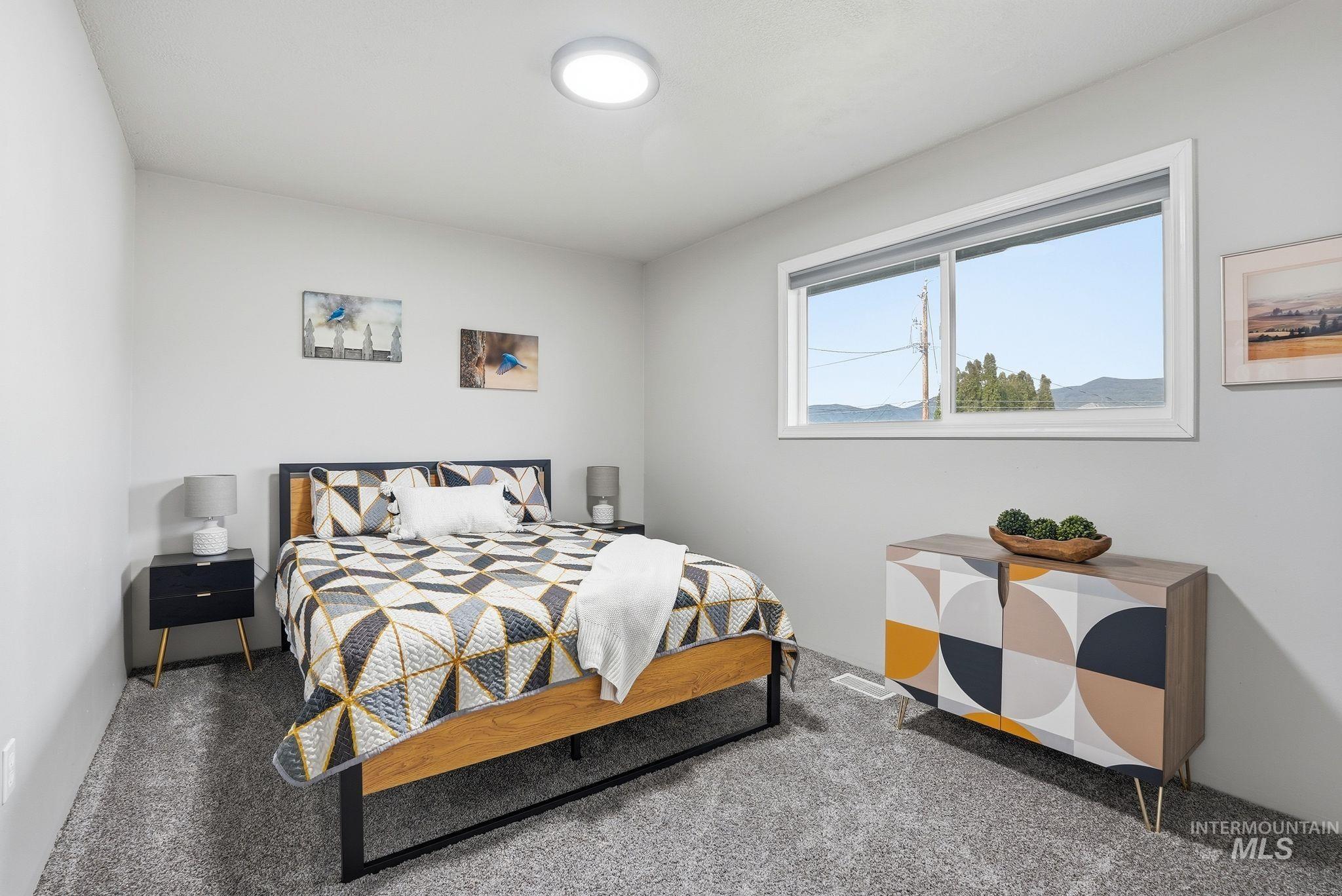Bedroom featuring carpet flooring