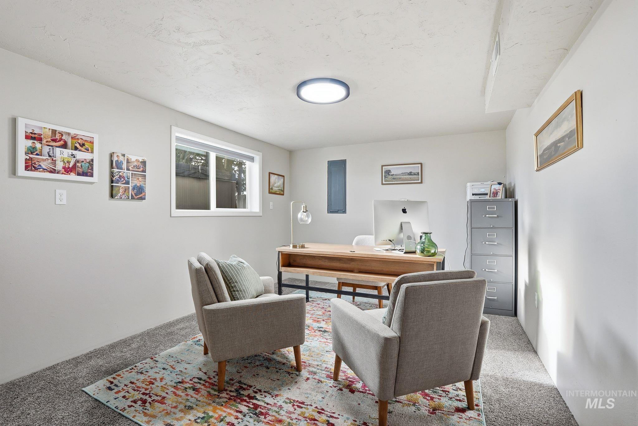 View of carpeted home office