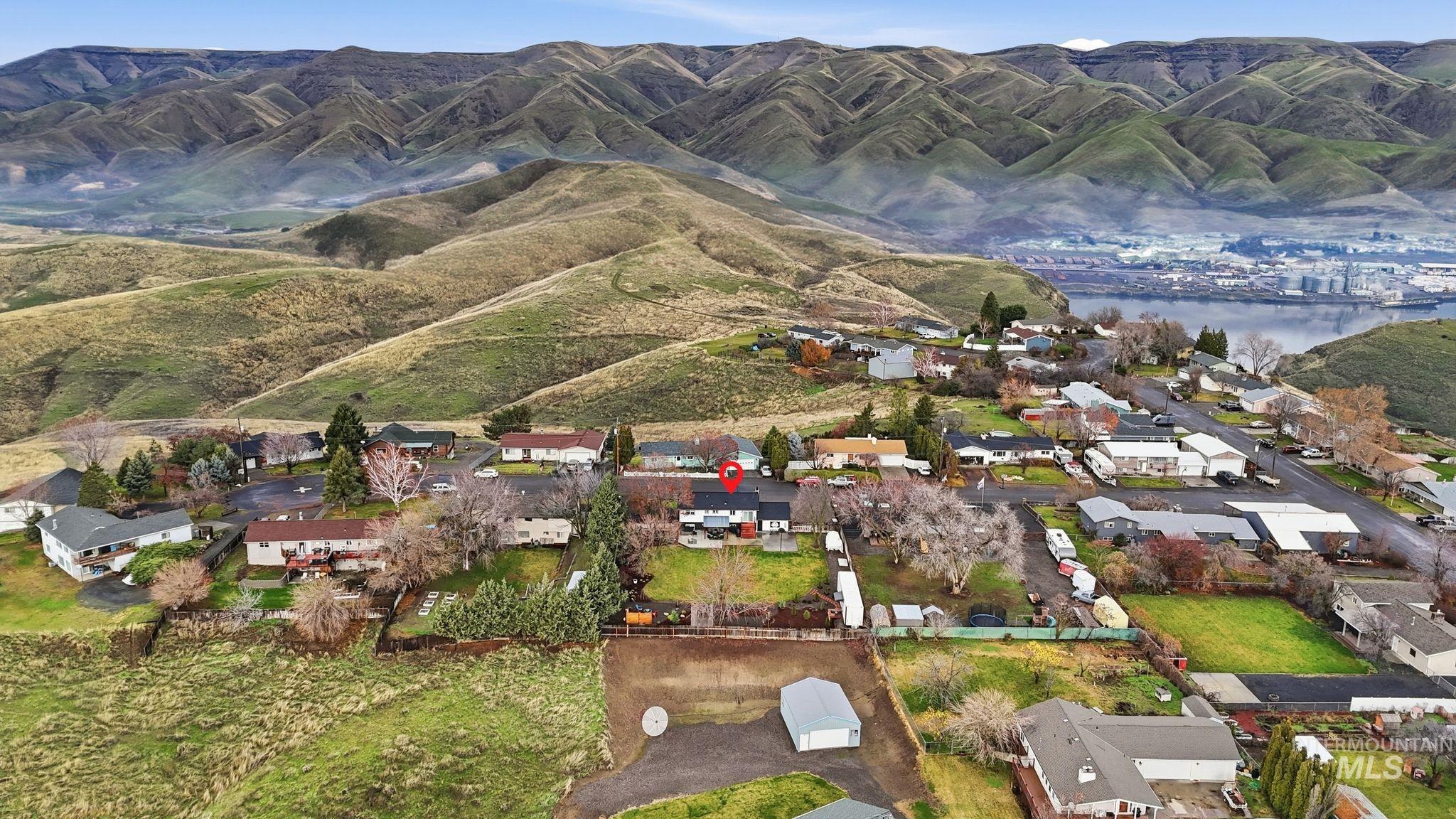 View of property location featuring nearby suburban area