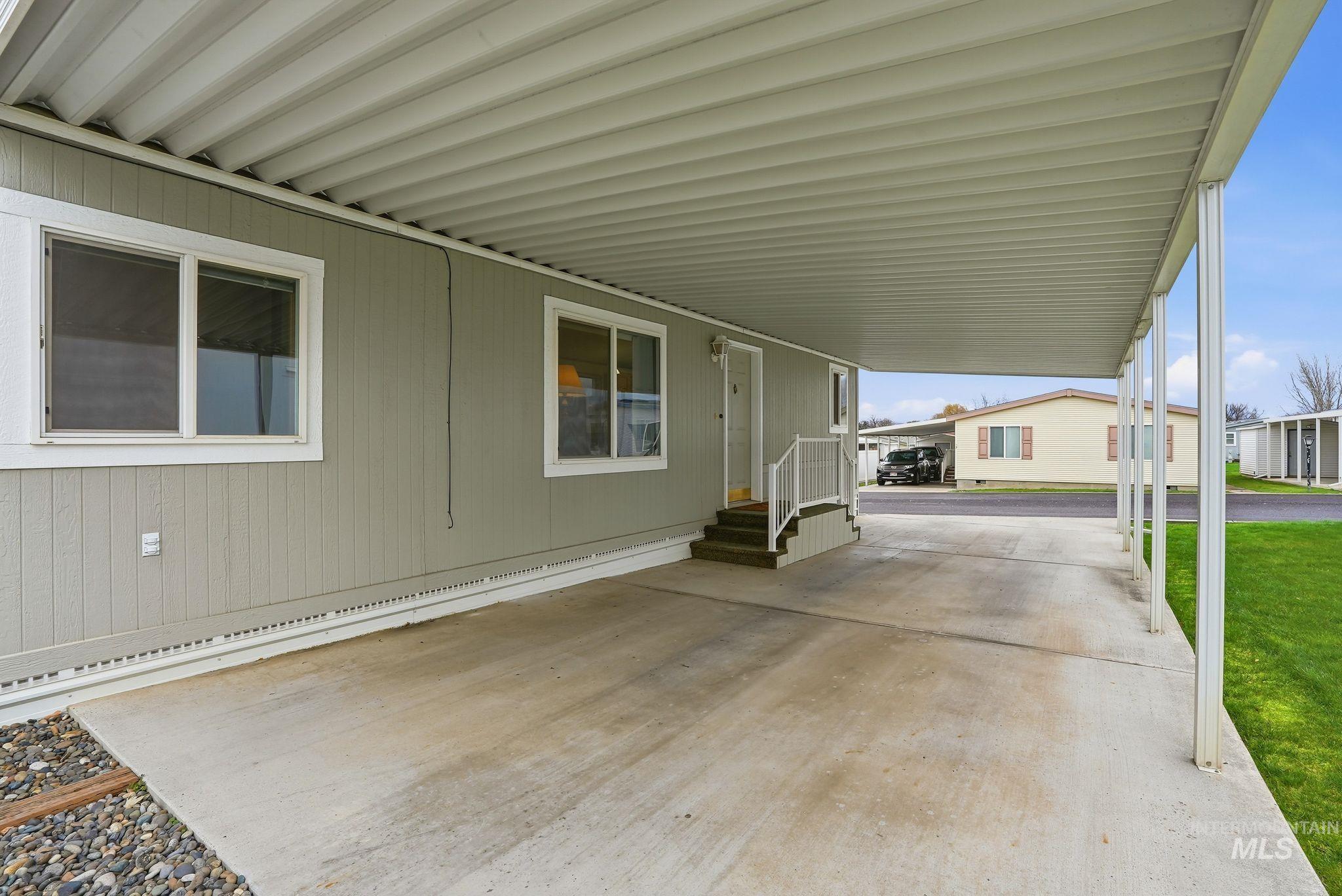 View of patio / terrace with an attached carport