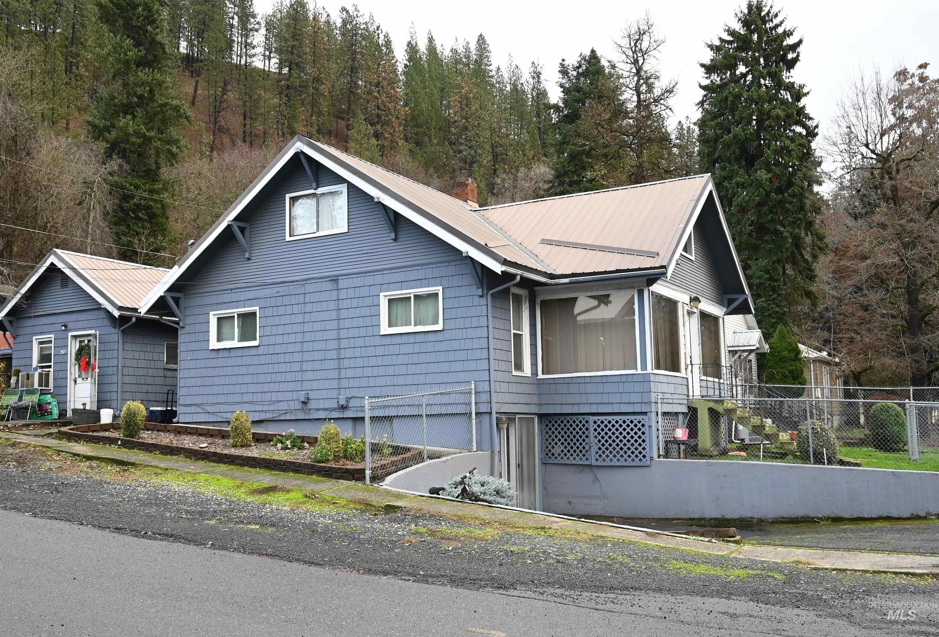 View of home's exterior featuring a metal roof