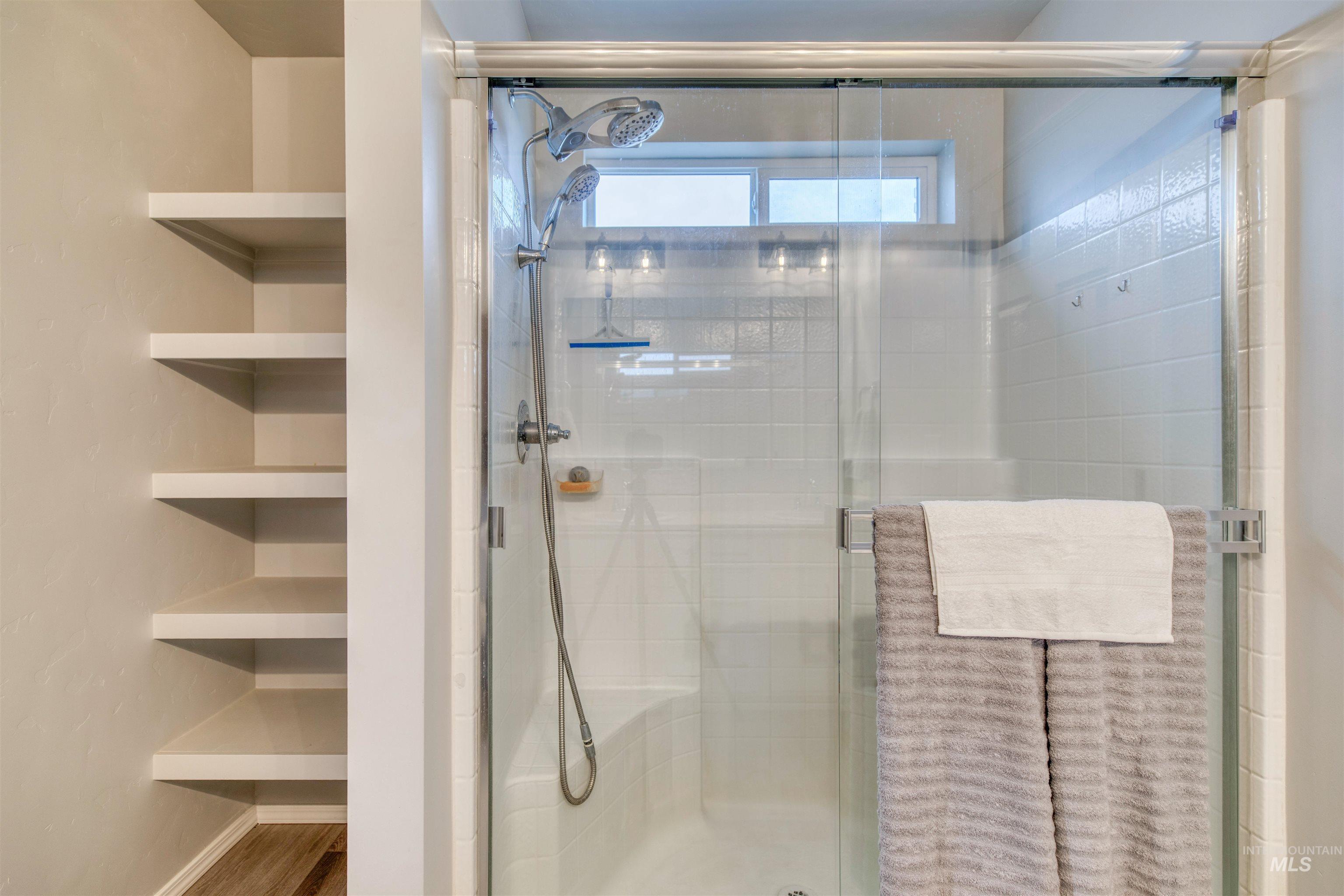 Bathroom featuring a shower stall