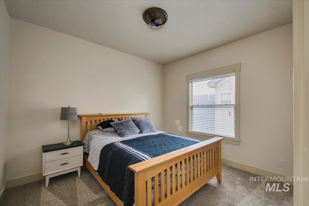 Bedroom featuring carpet