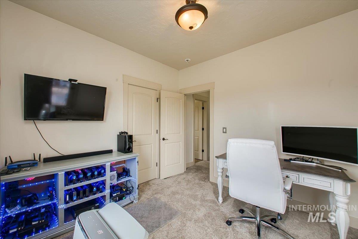 Office area with light colored carpet