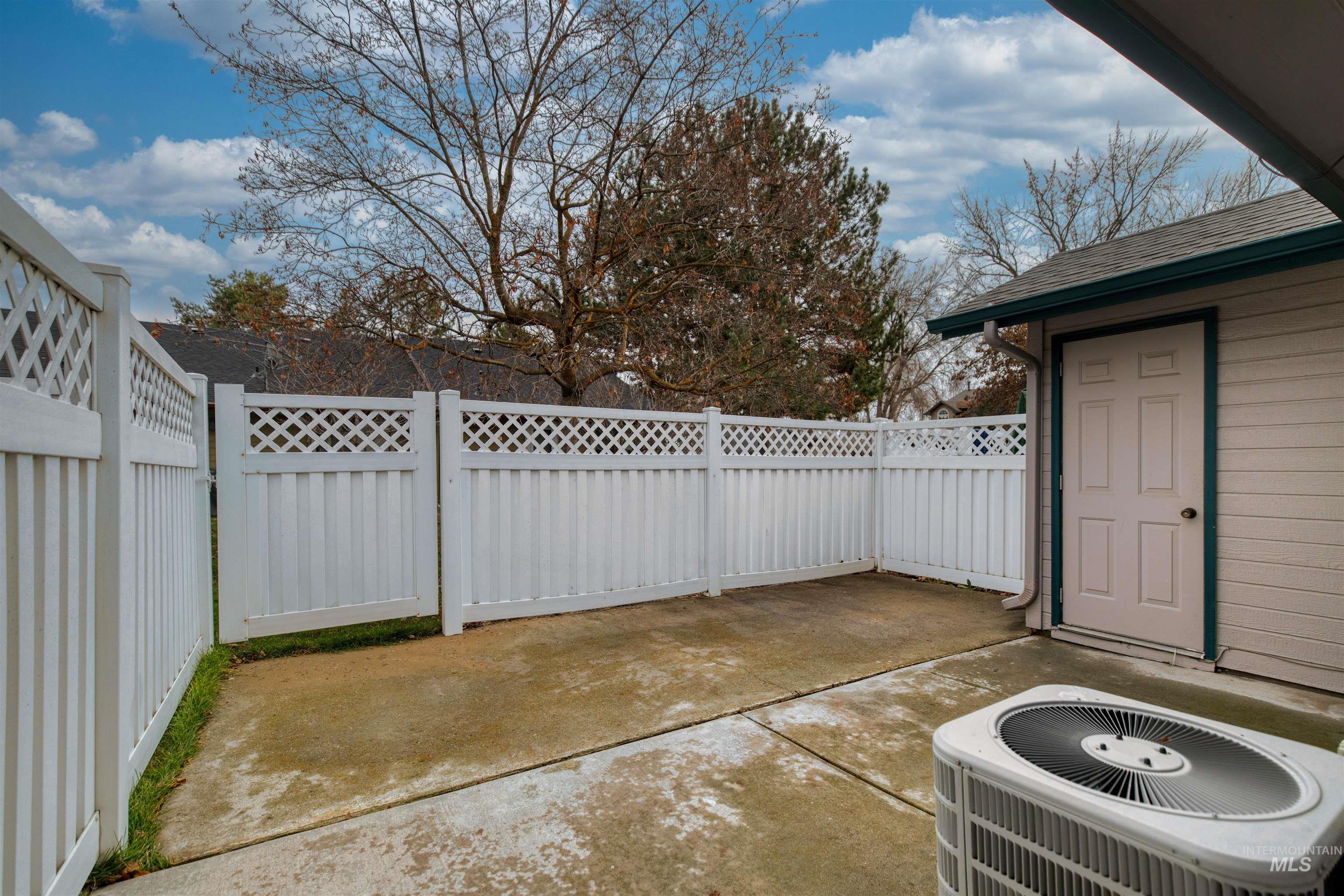 Fenced backyard featuring a patio area
