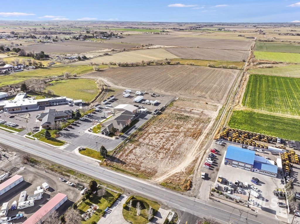 Aerial view of property's location with rural landscape