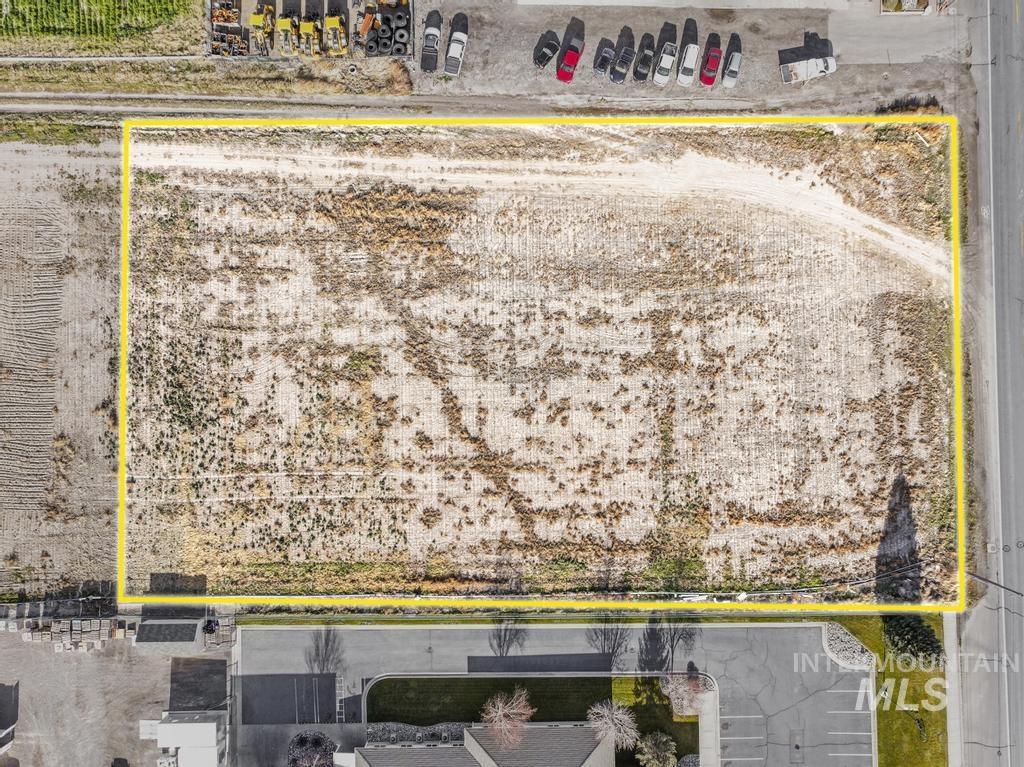 Aerial overview of property's location featuring property parcel outlined